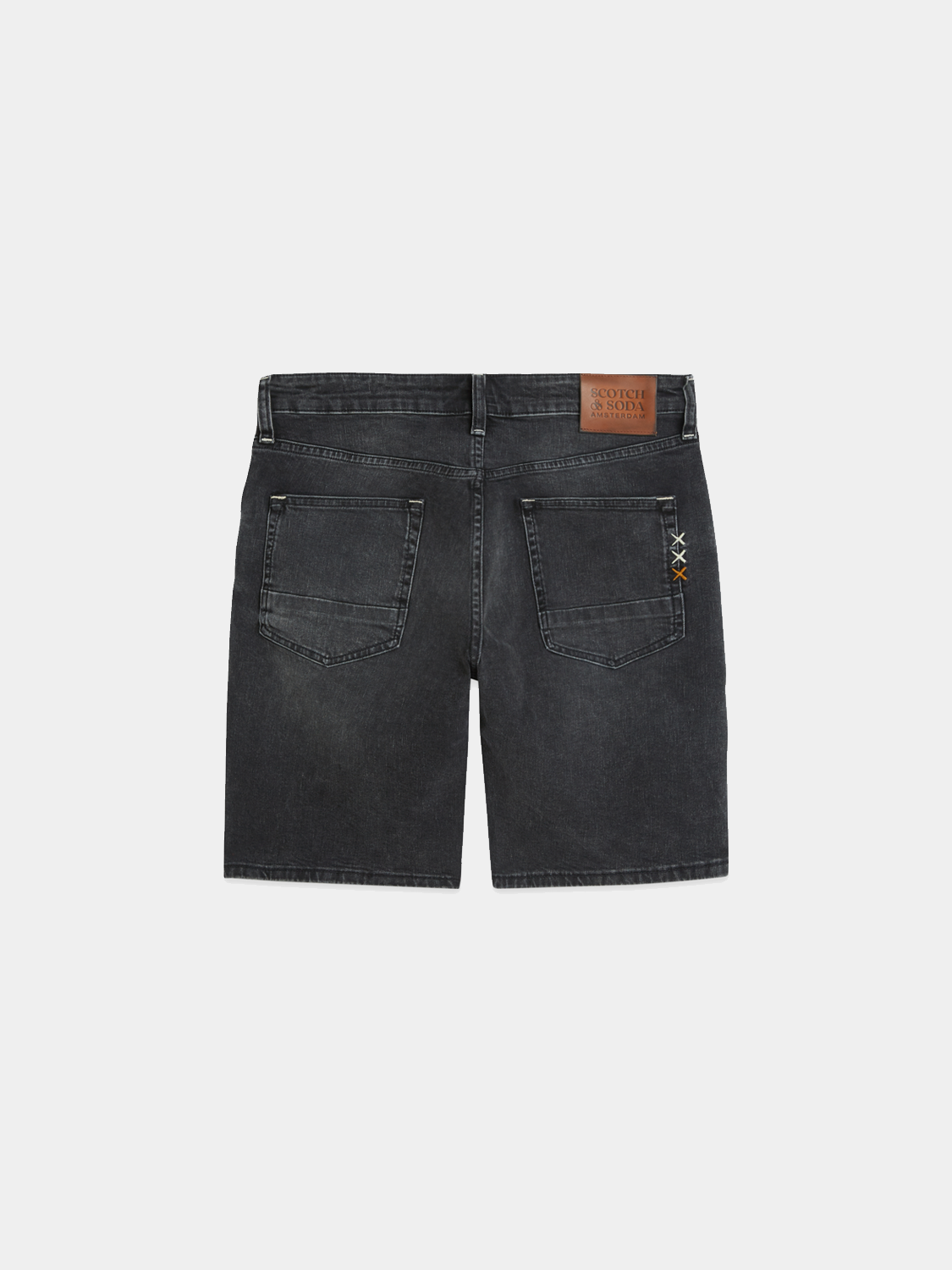 SCOTCH & SODA Ralston denim shorts with distressed details and rolled cuffs, displayed on a neutral background.