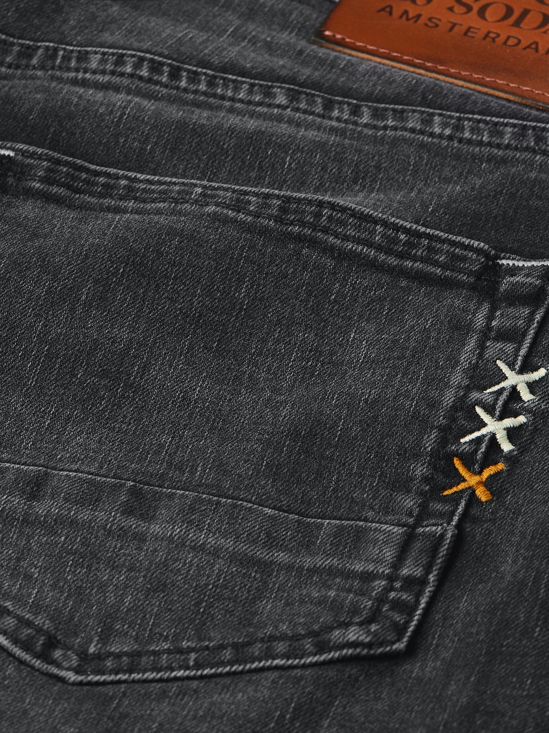 SCOTCH & SODA Ralston denim shorts with distressed details and rolled hems, casual fit for summer wear.
