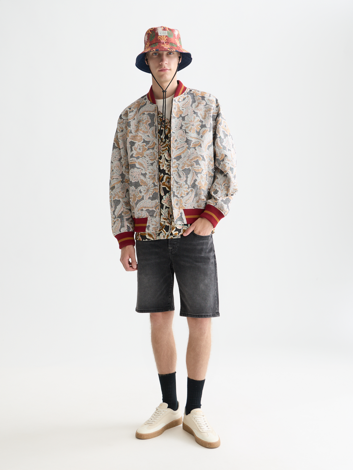 Scotch & Soda Ralston denim shorts with distressed details and rolled cuffs, casual summer style, front view.