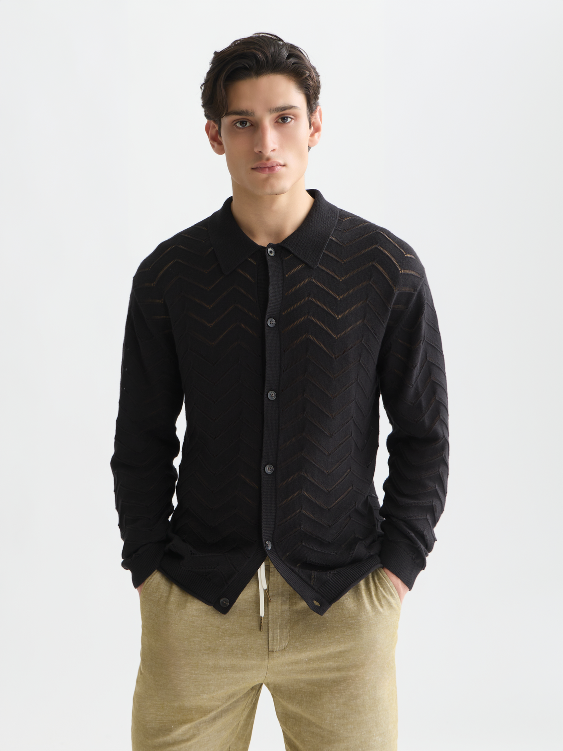 Light gray Scotch & Soda Pointelle cardigan featuring a delicate knitwear design with openwork pattern and button front.
