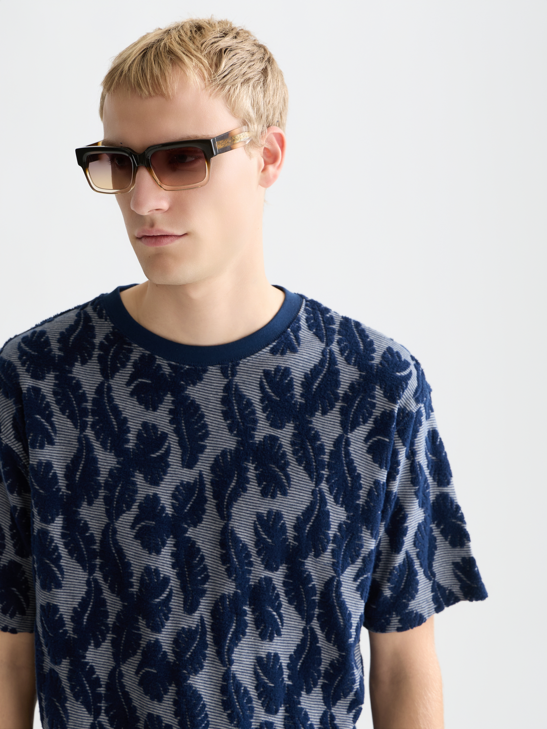 Striped Jacquard S/S T-shirt by Scotch & Soda featuring a stylish pattern and classic fit, shown on a model.