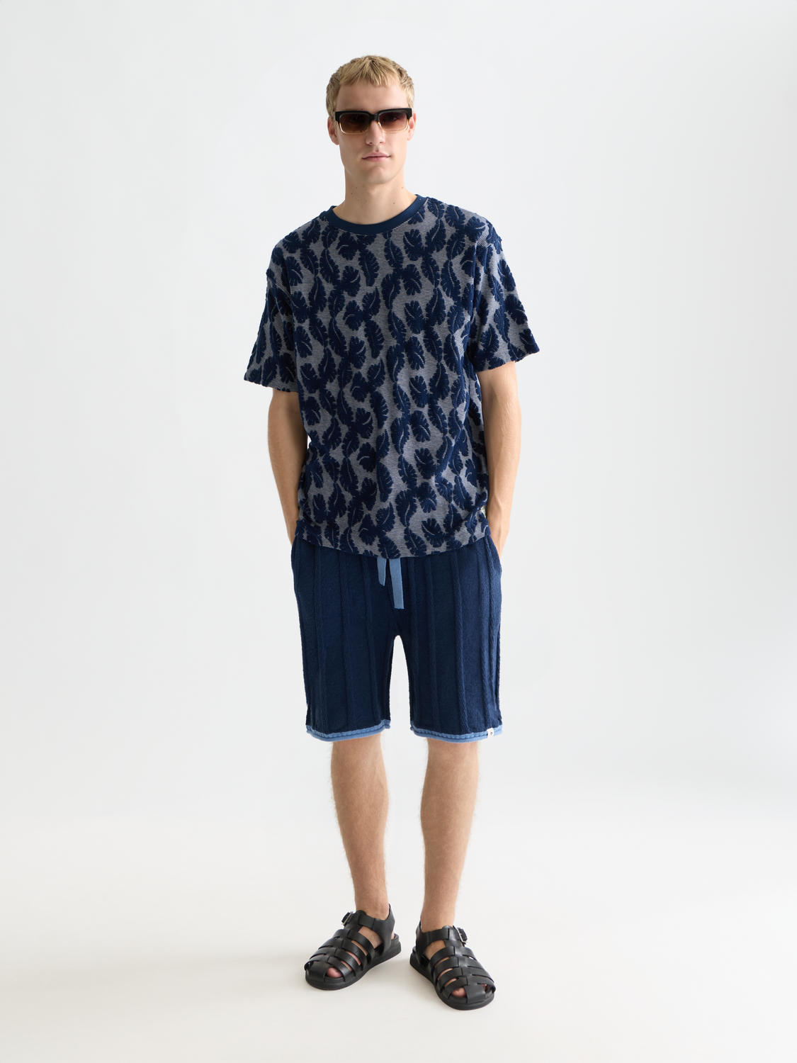 Striped jacquard S/S T-shirt by Scotch & Soda, showing a close-up of the textured fabric and stylish design.