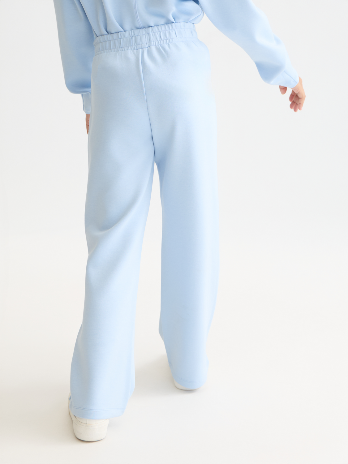 Kids' SCOTCH & SODA logo sweatpants with a relaxed fit and elastic waistband, shown from the back in the image.