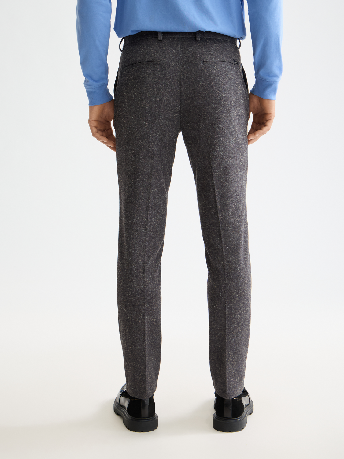 Scotch & Soda Stuart slim-fit chinos in navy, back view showing tailored pants with belt loops and clean stitching.