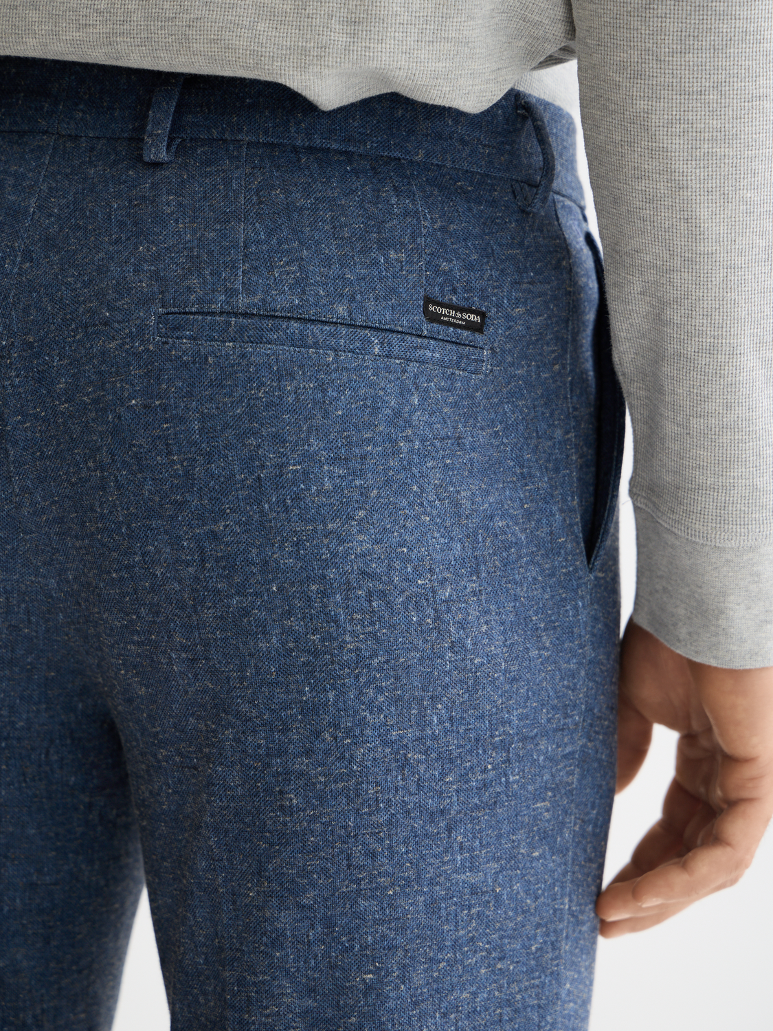 Scotch & Soda Stuart slim-fit chinos, men's casual pants in neutral color, shown on a model with front view.