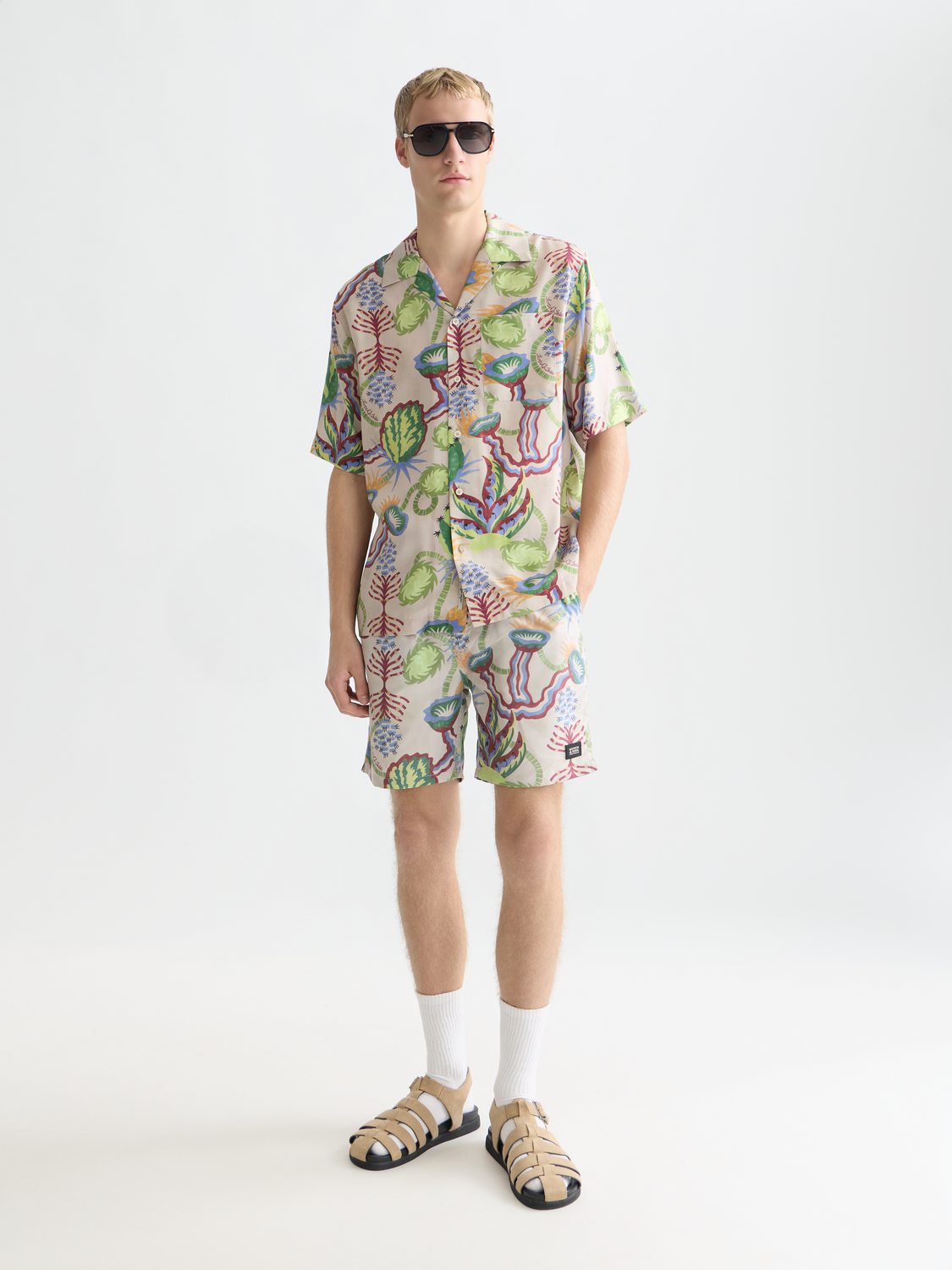 Printed swimshorts by Scotch & Soda in vibrant colors, featuring a stylish pattern and comfortable fit for beach or poolside wear.