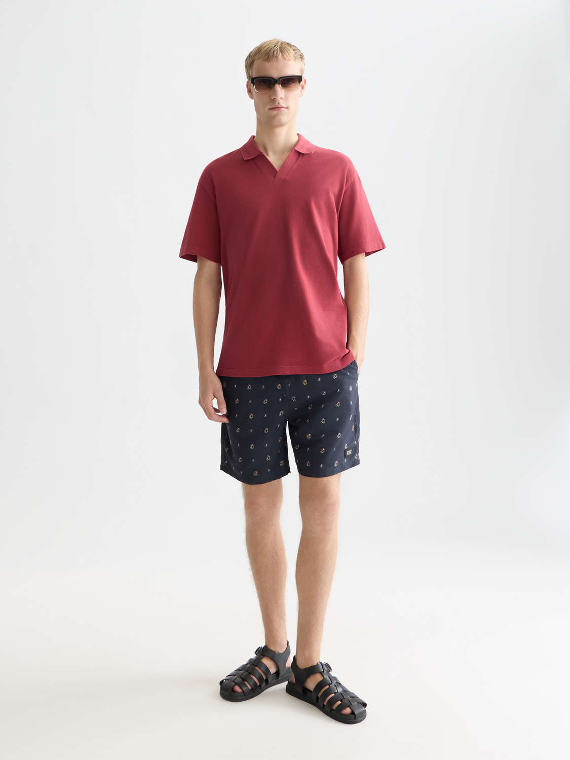 Printed swimshorts by Scotch & Soda featuring vibrant patterns and a comfortable fit, perfect for beach or poolside wear.