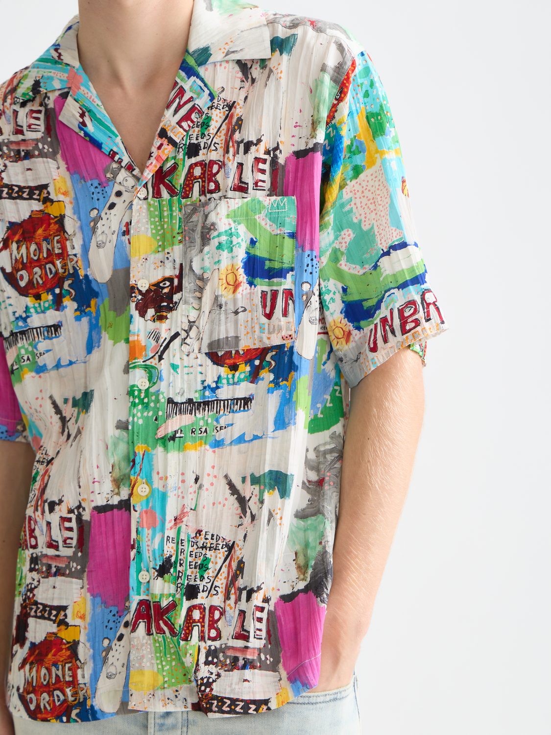 Scarlett S&S x Basquiat printed short-sleeved shirt from Scotch & Soda featuring colorful artwork and casual fit.
