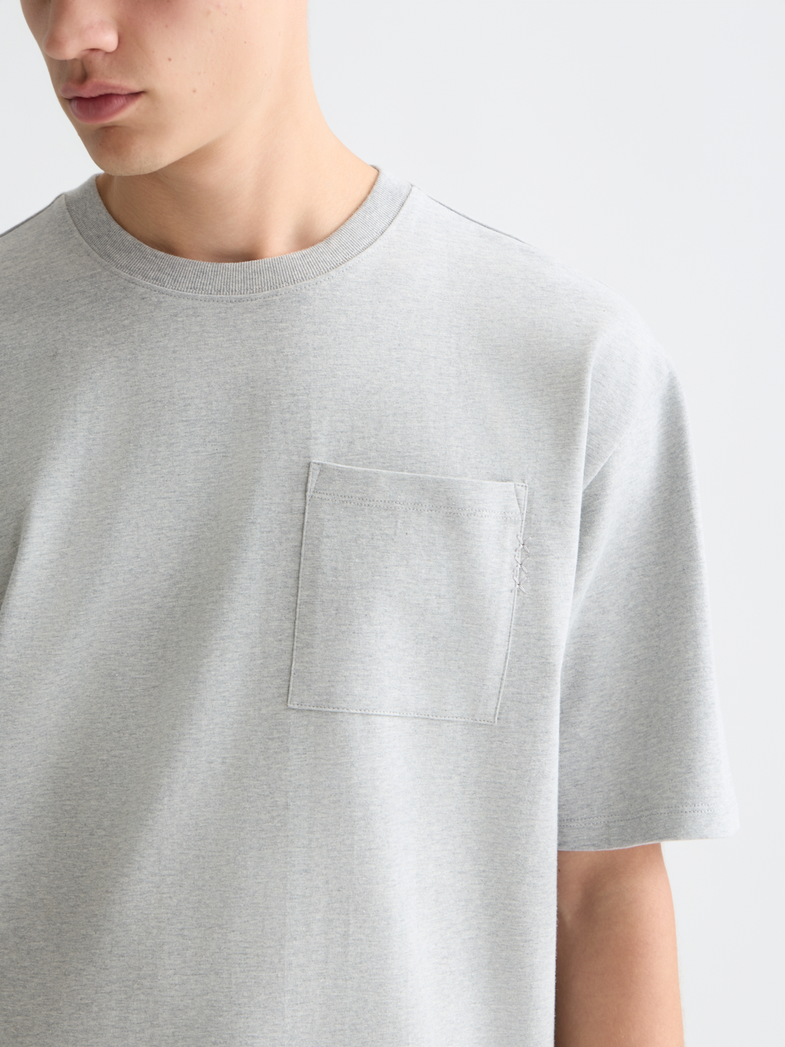 Light blue Scotch & Soda short-sleeve chest pocket t-shirt with a relaxed fit and classic crew neckline.