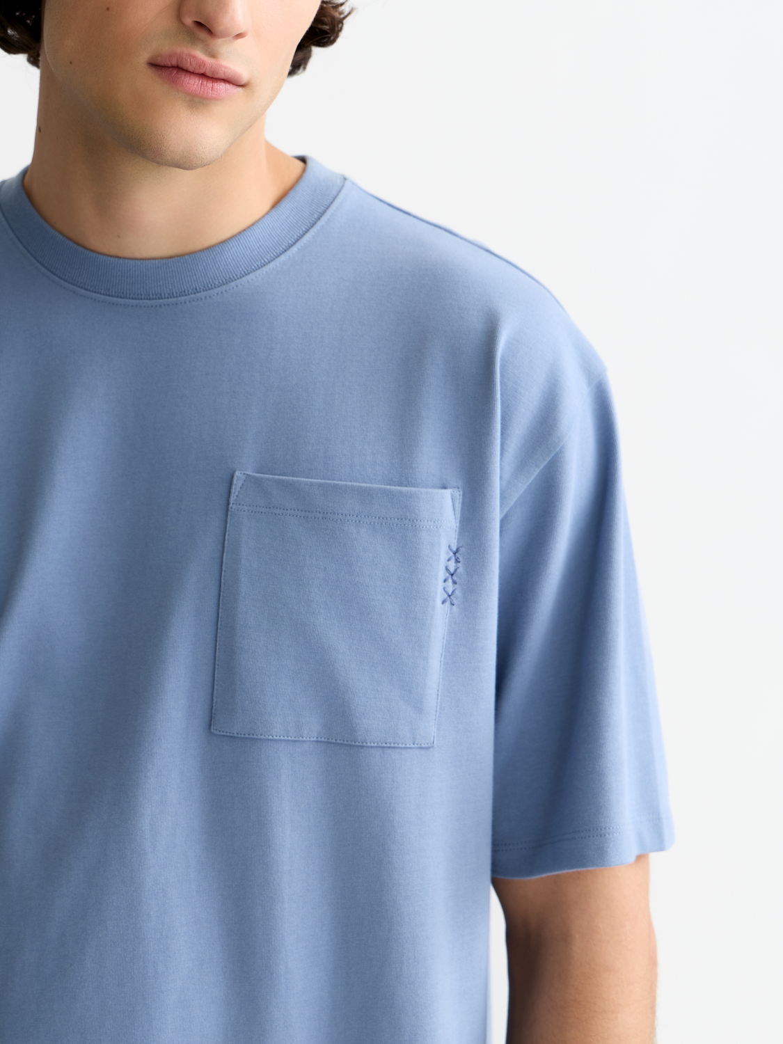 SCOTCH & SODA short-sleeve chest pocket t-shirt in soft cotton with a classic fit and subtle branding detail.