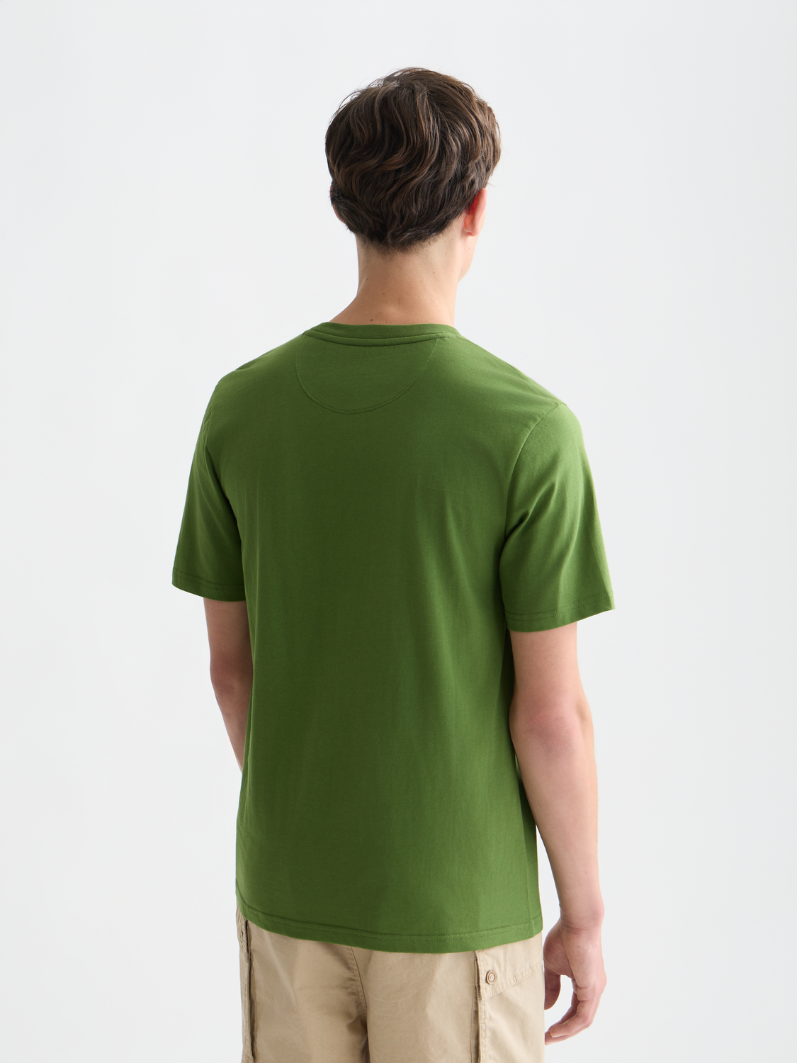 Black short-sleeve Scotch & Soda logo t-shirt with front graphic and casual fit, displayed on a plain background.