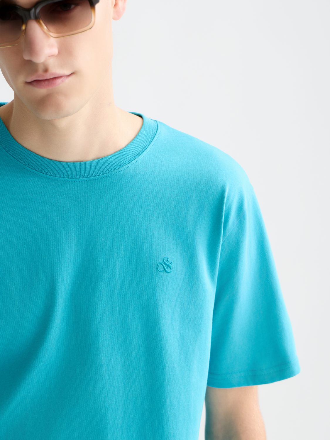 SCOTCH & SODA logo short sleeve t-shirt shown in a close-up image with a graphic logo on the front.