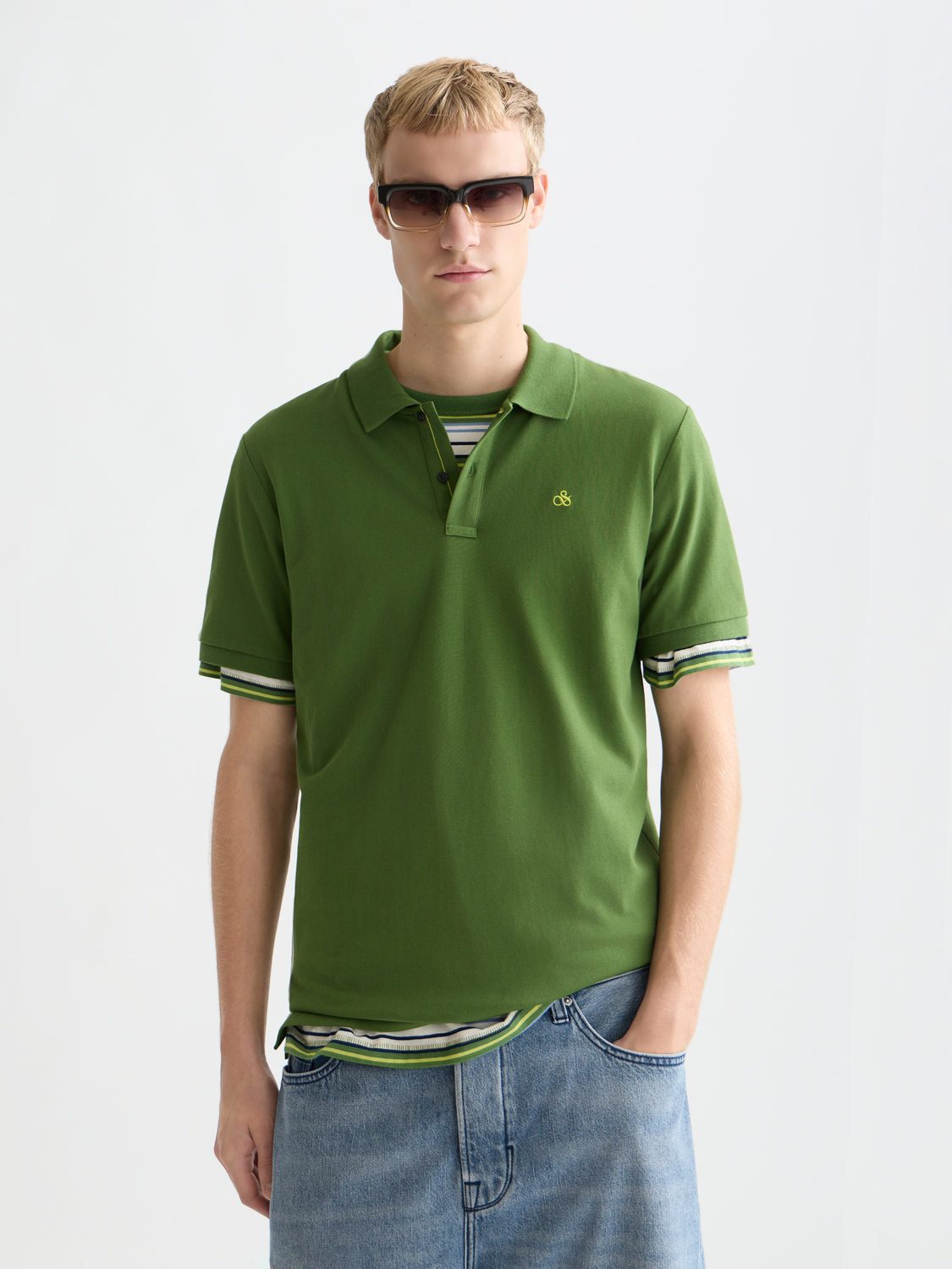 Scotch & Soda logo pique polo shirt in navy with embroidered logo on chest and classic collar, front view.