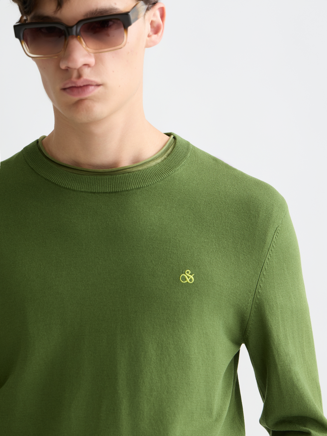 Scotch & Soda viscose knit pullover featuring a relaxed fit and ribbed cuffs, displayed on a neutral background.