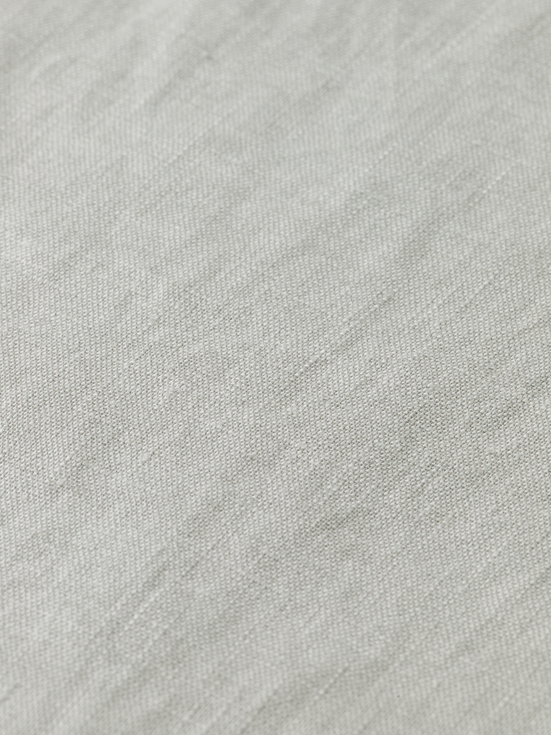 Long-sleeve Scotch & Soda linen shirt displayed on a hanger, showcasing lightweight fabric and casual style.