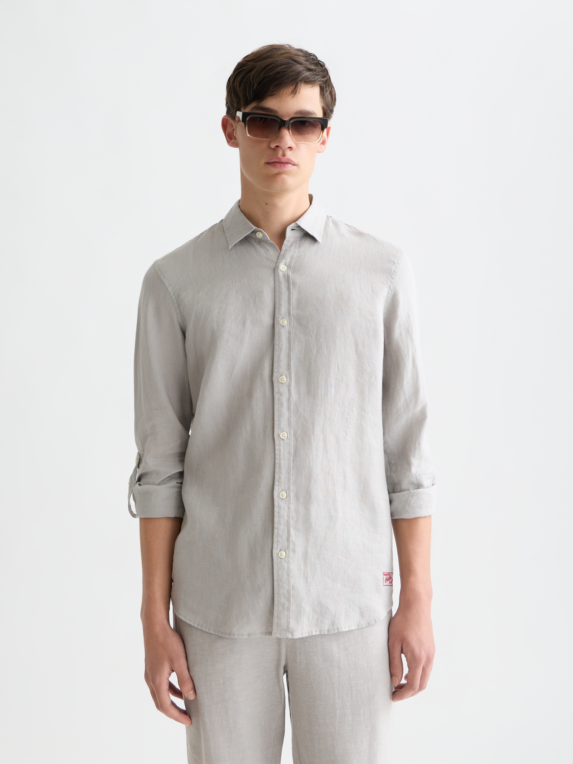 Long-sleeve linen shirt by Scotch & Soda, featuring a relaxed fit and lightweight fabric, shown in a front view.