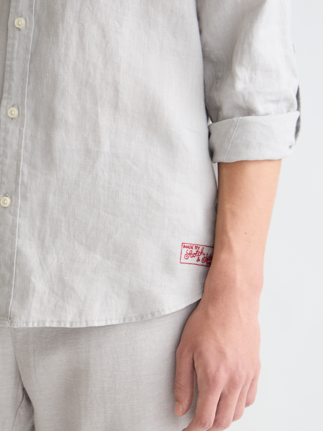 Long-sleeve linen shirt by Scotch & Soda, lightweight and breathable fabric, in a casual style with a collar and button front.