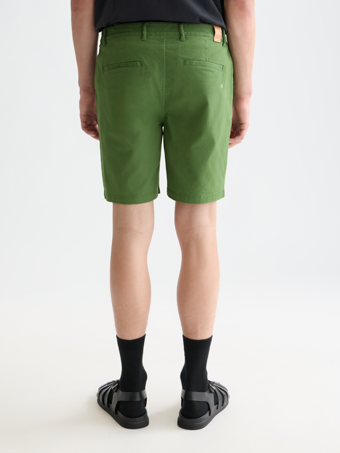 Back view of Scotch & Soda Stuart chino shorts in light beige, showcasing the relaxed fit and classic style.