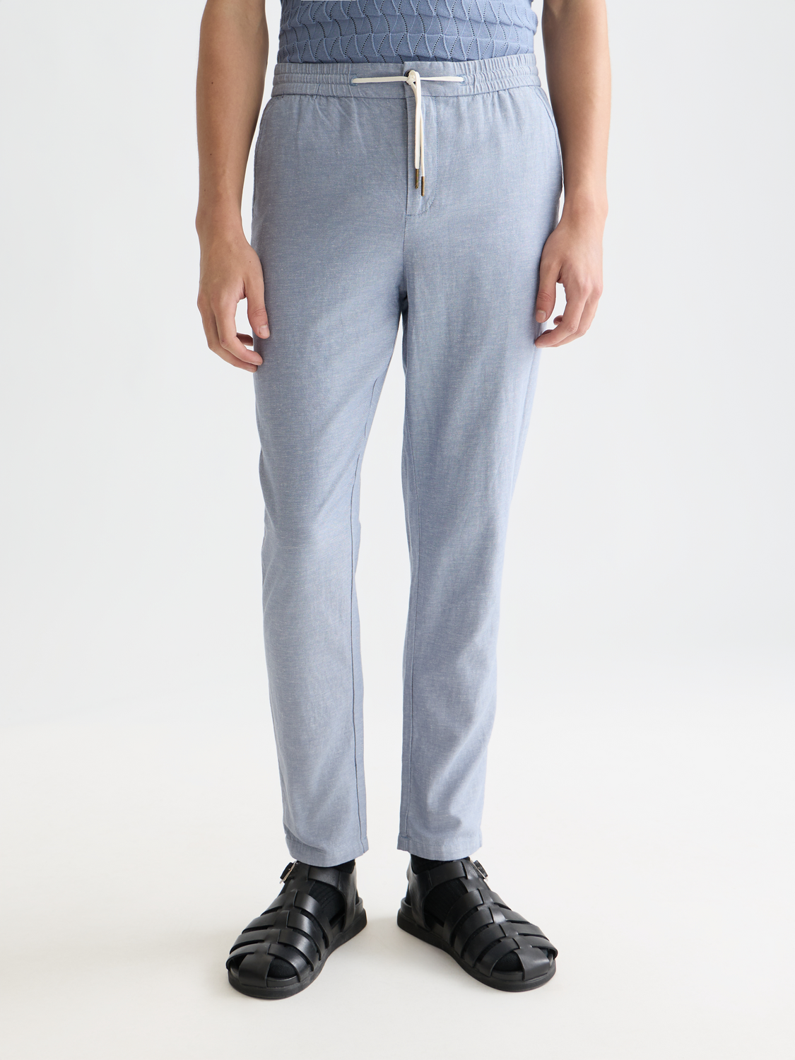 SCOTCH & SODA Warren joggers in dark green, showing front view with relaxed fit and elastic waistband.