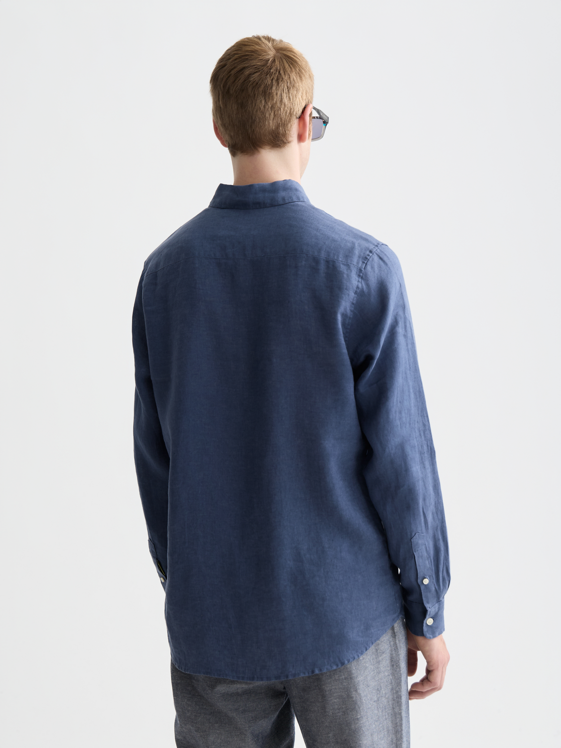 Long sleeve linen shirt by Scotch & Soda, shown from the back in a casual fit with a classic collar and relaxed style.