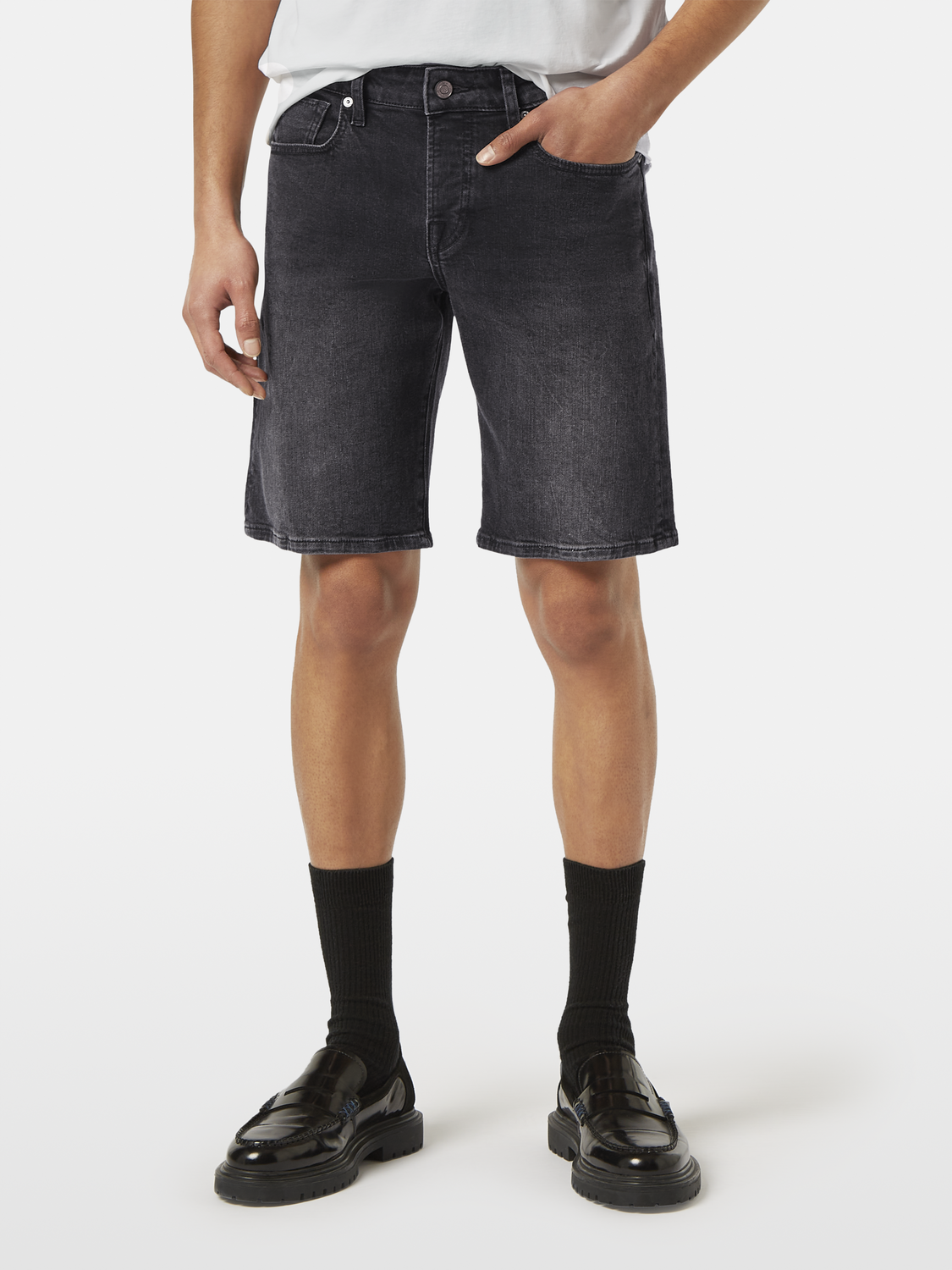 SCOTCH & SODA Ralston denim shorts with rolled cuffs, front pockets, and distressed details on light blue denim fabric.