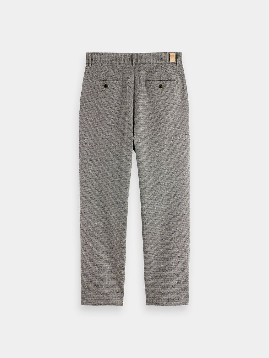 Basket weave Scotch & Soda chinos pants with a classic fit, shown in a close-up view highlighting the fabric texture.