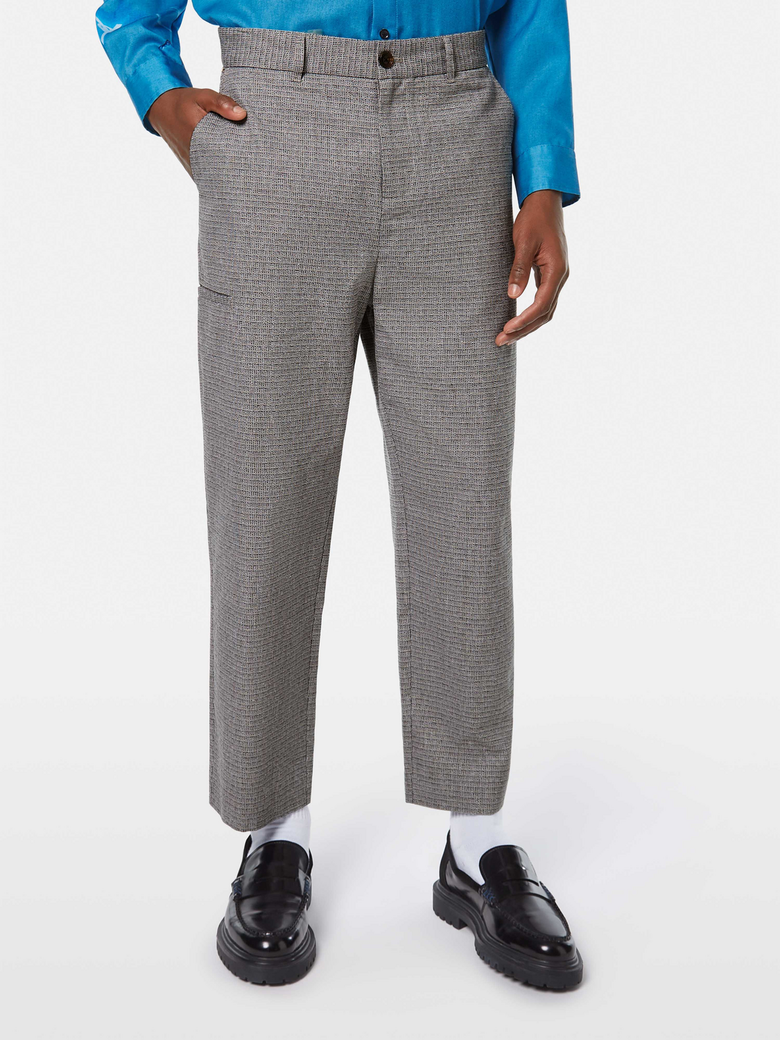 Basket weave chinos pants by Scotch & Soda, showcasing the textured fabric, slim fit, and classic design in a neutral color.