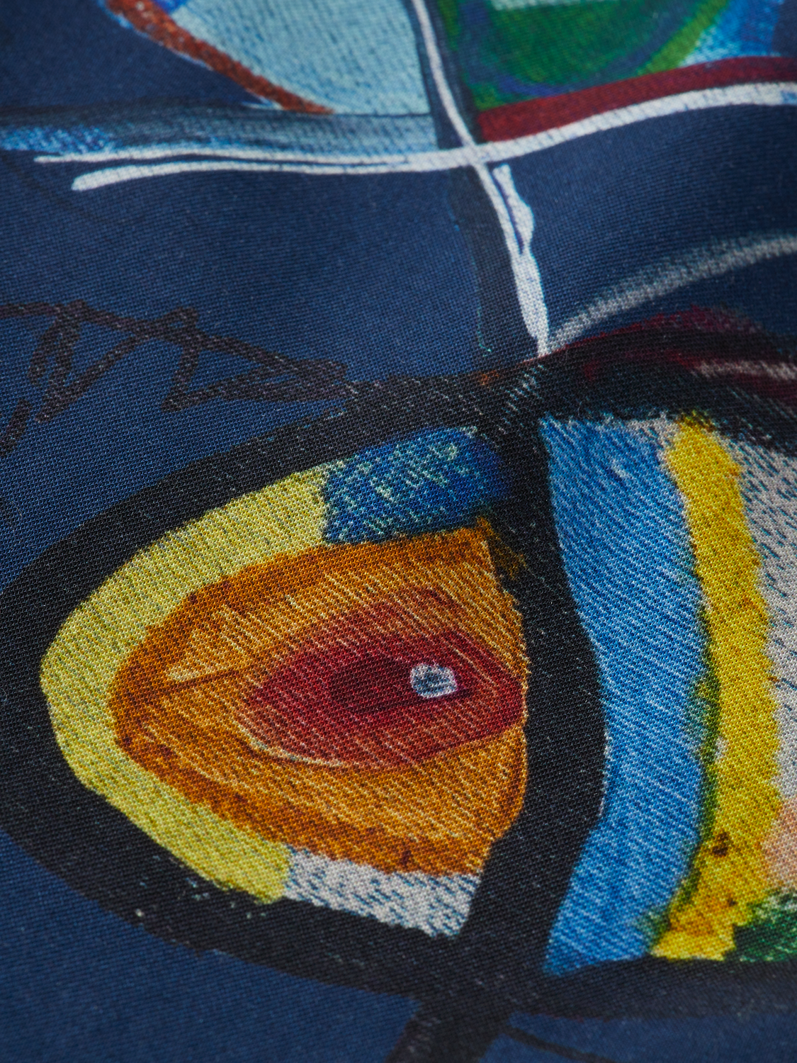Fave printed shorts by Scotch & Soda featuring vibrant colorful patterns and casual fit, displayed on a neutral background.