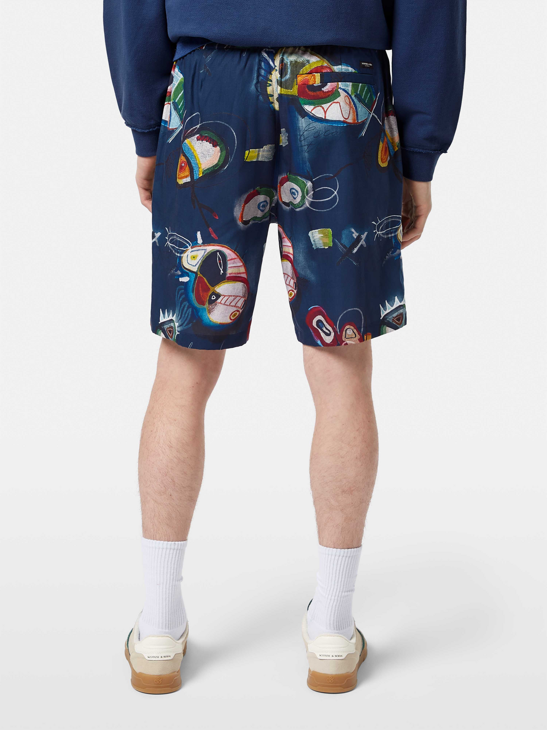 Scotch & Soda Fave printed shorts with colorful floral pattern, back view showing vibrant design and casual fit.