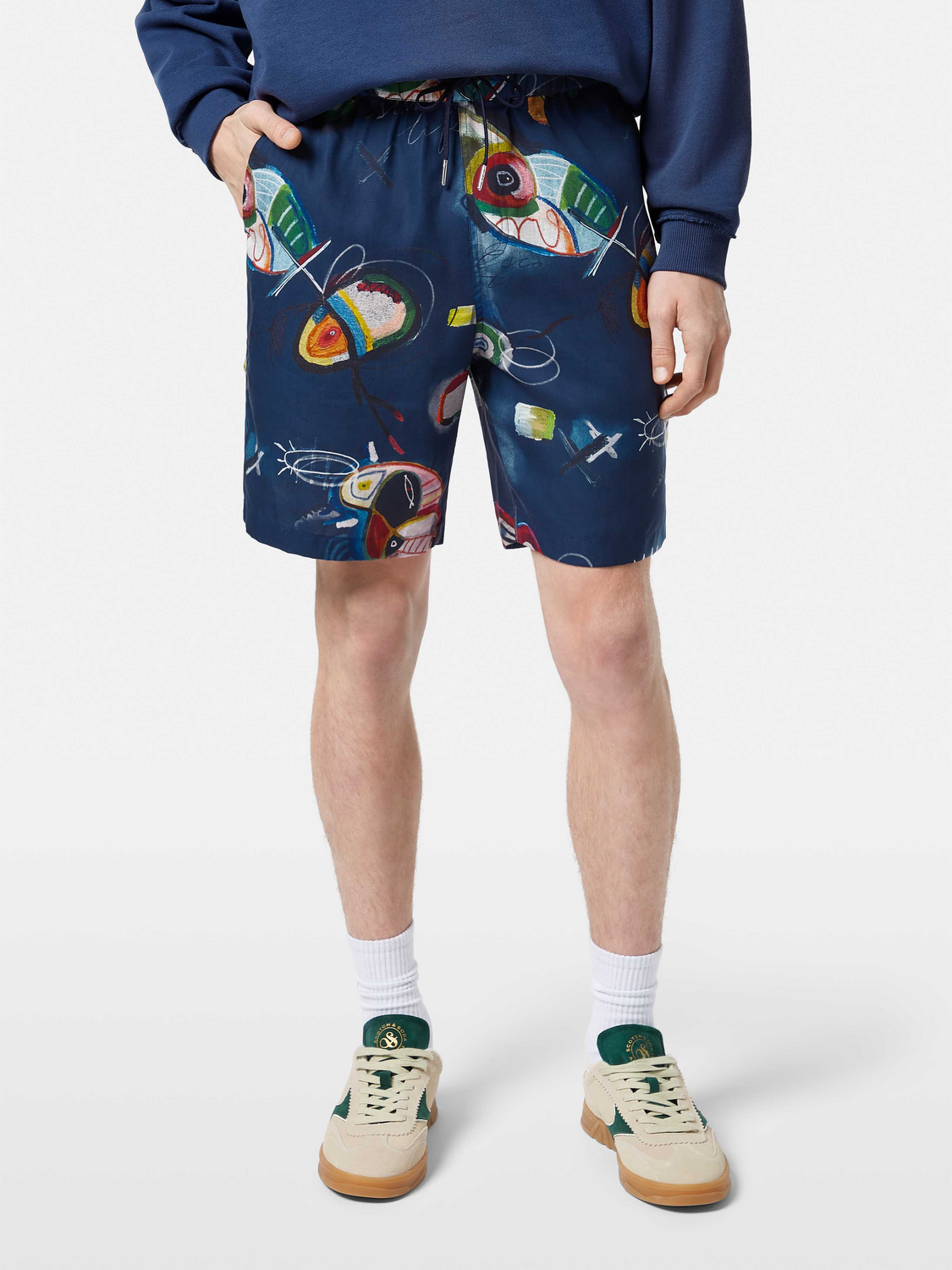 SCOTCH & SODA Fave printed shorts featuring colorful floral and abstract patterns on lightweight fabric.