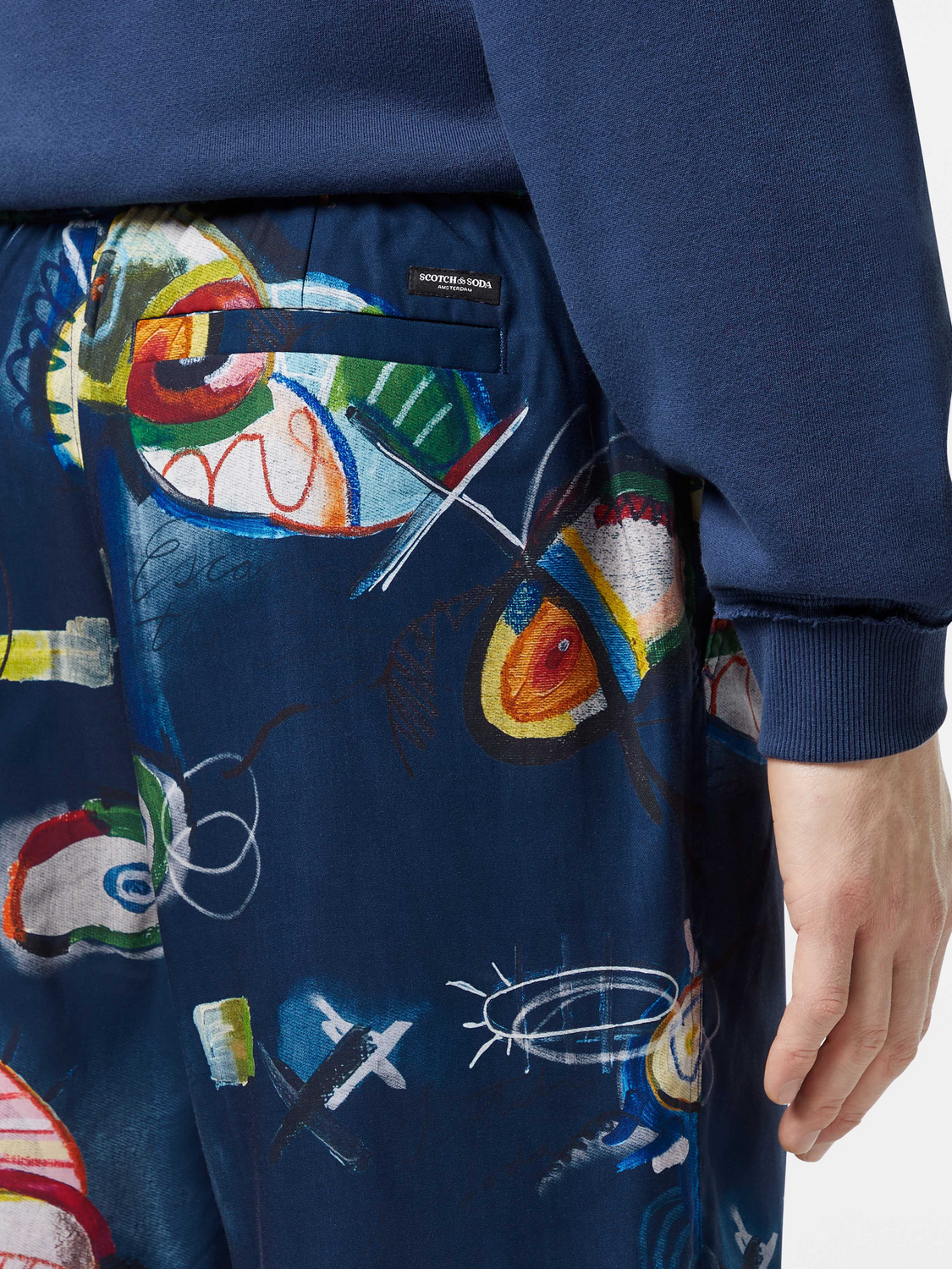 Fave printed shorts by Scotch & Soda featuring a vibrant, colorful pattern and relaxed fit, perfect for casual summer wear.
