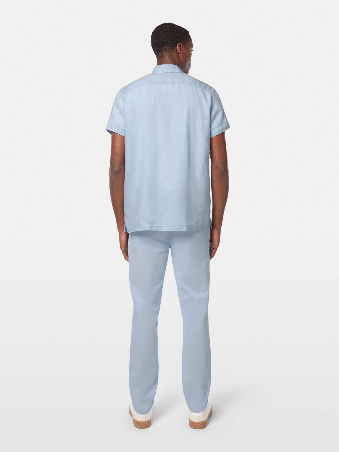 Short-sleeved linen shirt by Scotch & Soda, shown from the back with a relaxed fit and casual style.