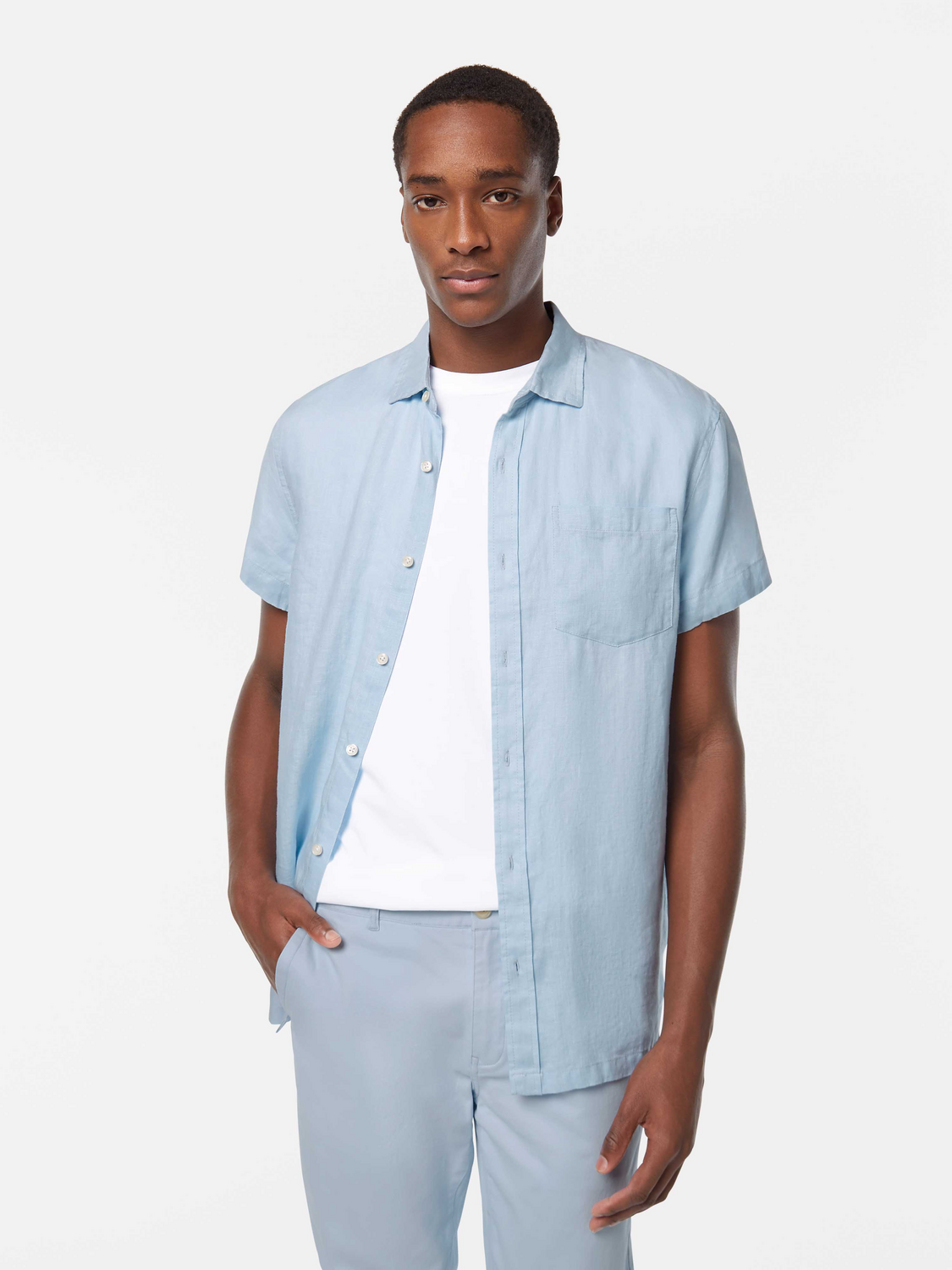 Short-sleeved linen shirt by Scotch & Soda, featuring a relaxed fit and breathable fabric, displayed on a model.