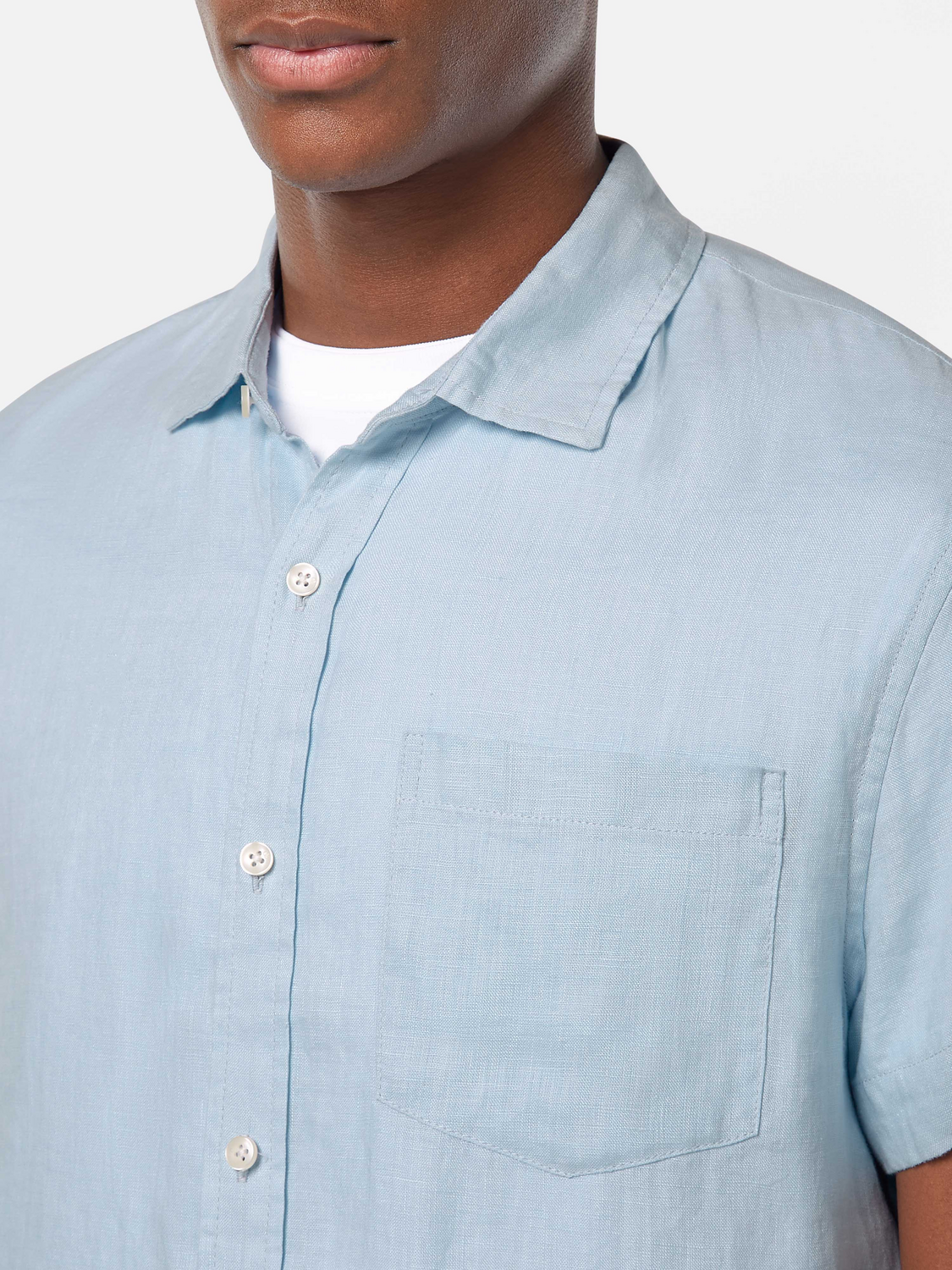 Short-sleeved linen shirt by Scotch & Soda, featuring a relaxed fit and natural fabric in a casual style.