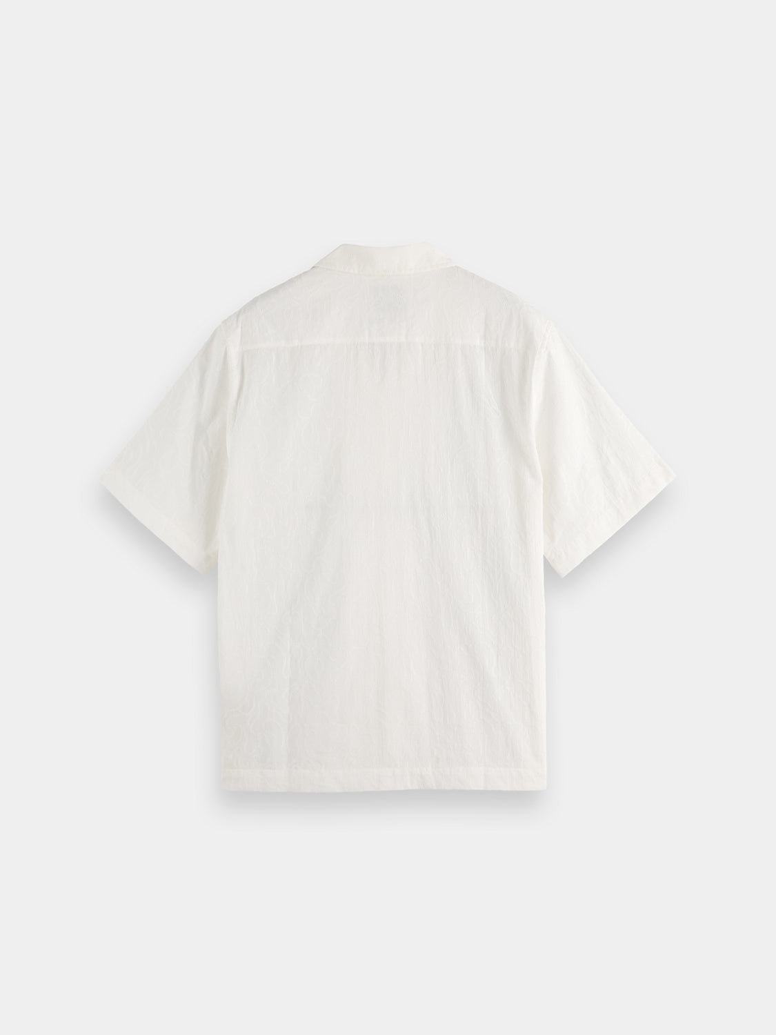Embroidered short-sleeve shirt by Scotch & Soda featuring detailed embroidery on light fabric, front view.