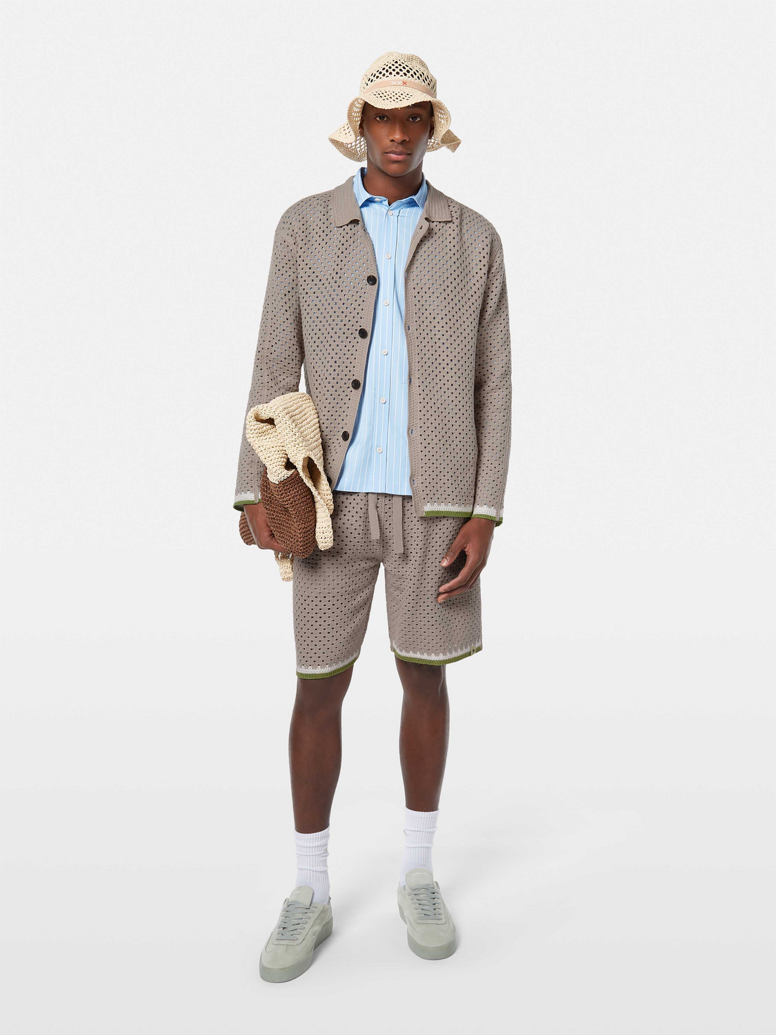 Crochet-knit shirt by Scotch & Soda, featuring detailed stitch pattern and classic fit, displayed on a plain background.