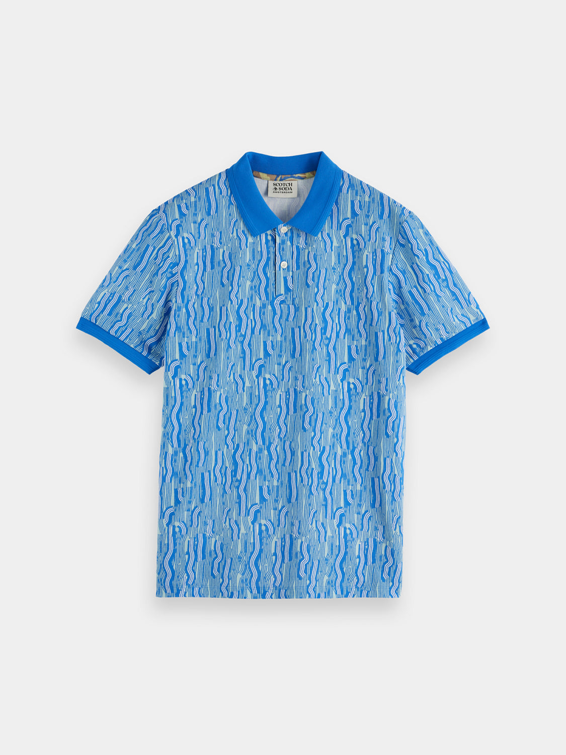 Printed polo shirt by Scotch & Soda featuring vibrant patterns and a classic collar, displayed on a neutral background.