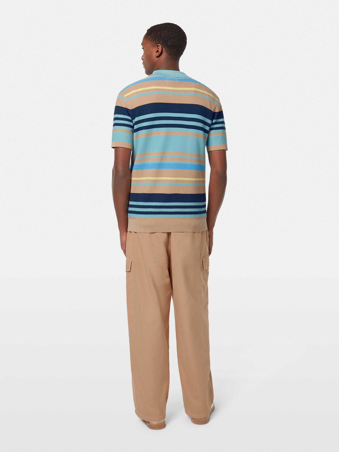 Blue knitted polo shirt by Scotch & Soda featuring a classic collar and textured knit fabric.