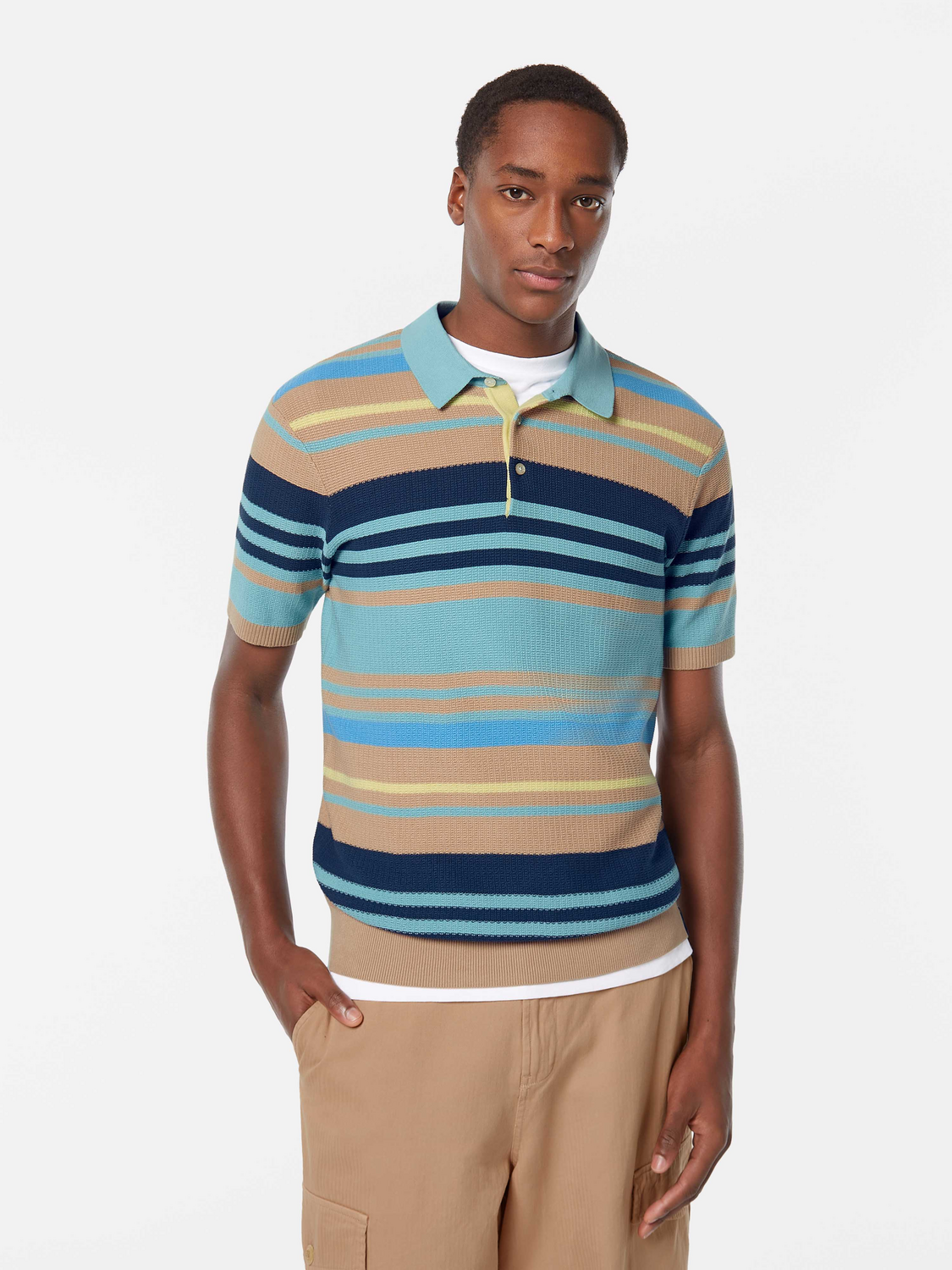 Blue knitted polo shirt by Scotch & Soda, featuring a classic collar and textured knit fabric.