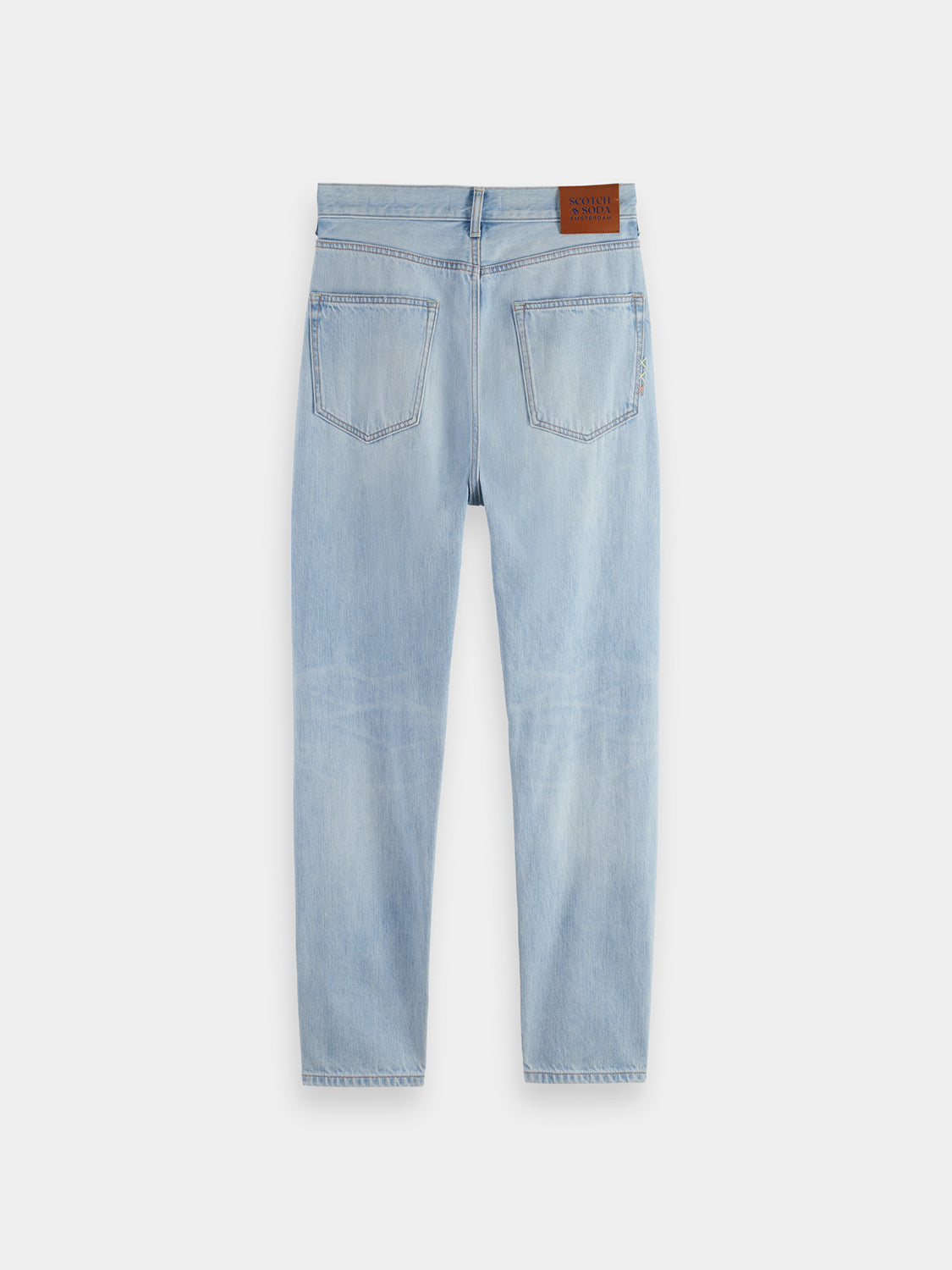 Dark blue Scotch & Soda Dean tapered denim jeans with a classic fit, displayed on a neutral background.