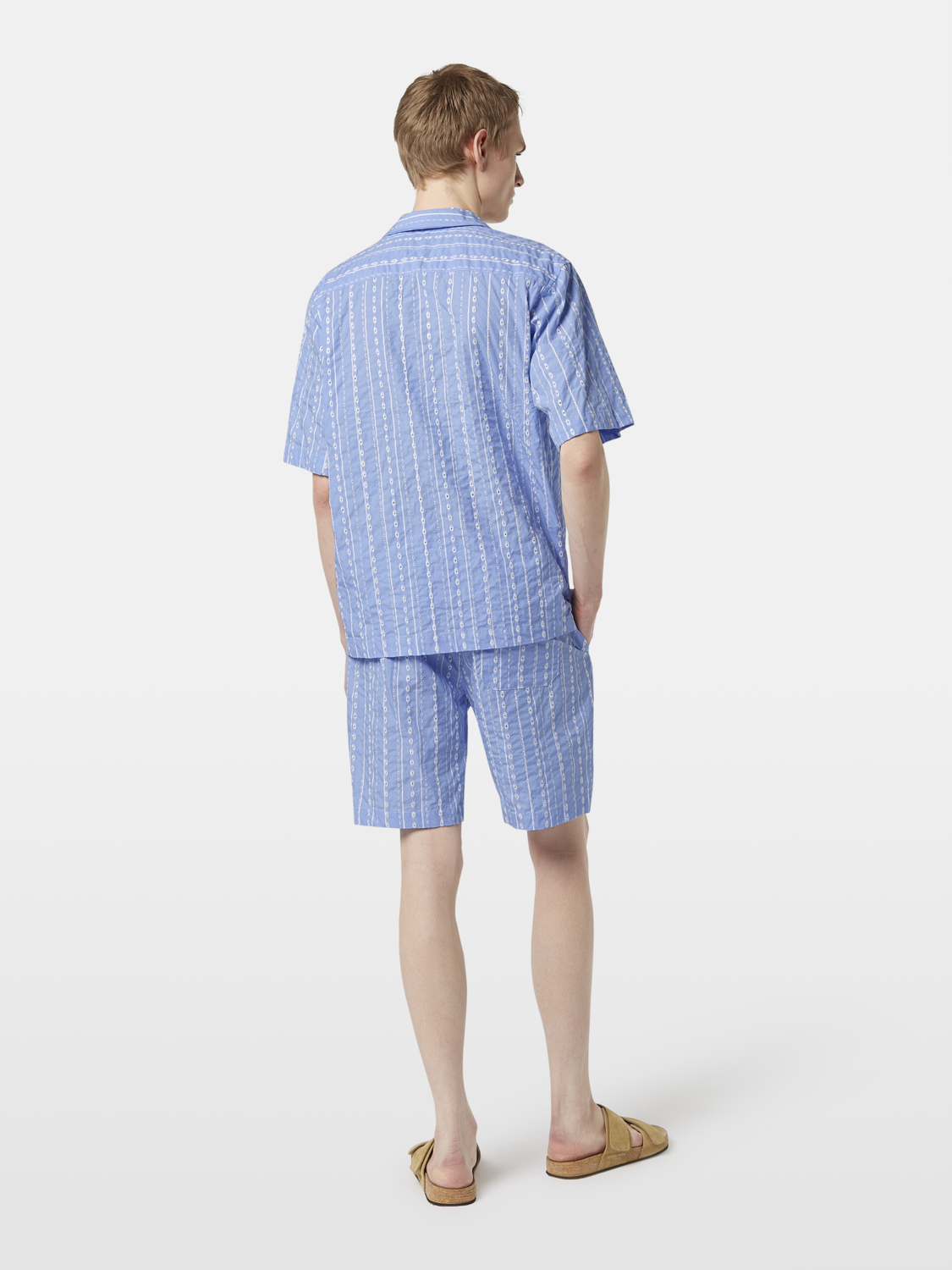 Embroidered short-sleeve shirt by Scotch & Soda featuring detailed embroidery on light fabric, shown from the back.