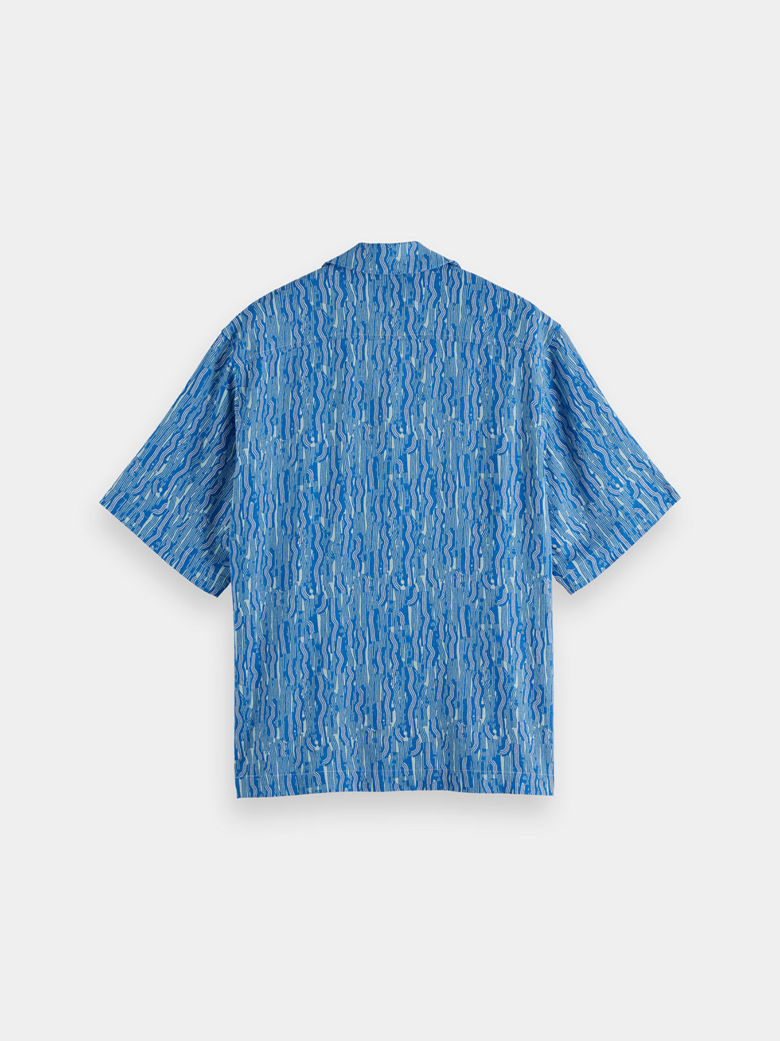 Short-sleeved printed shirt by Scotch & Soda featuring vibrant patterns and casual fit, shown in black color.