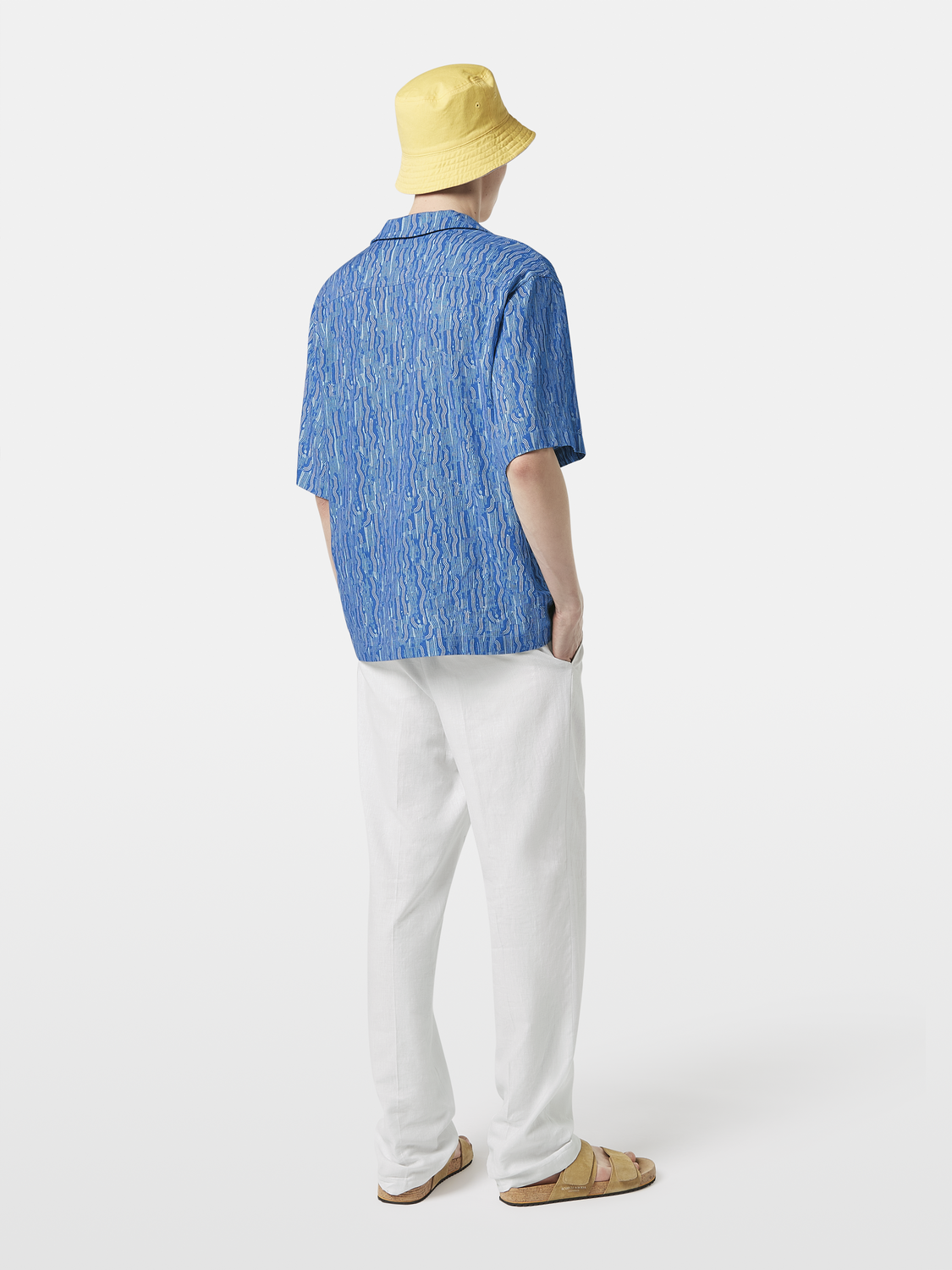 Short-sleeved printed shirt by Scotch & Soda featuring vibrant colorful patterns on lightweight fabric.
