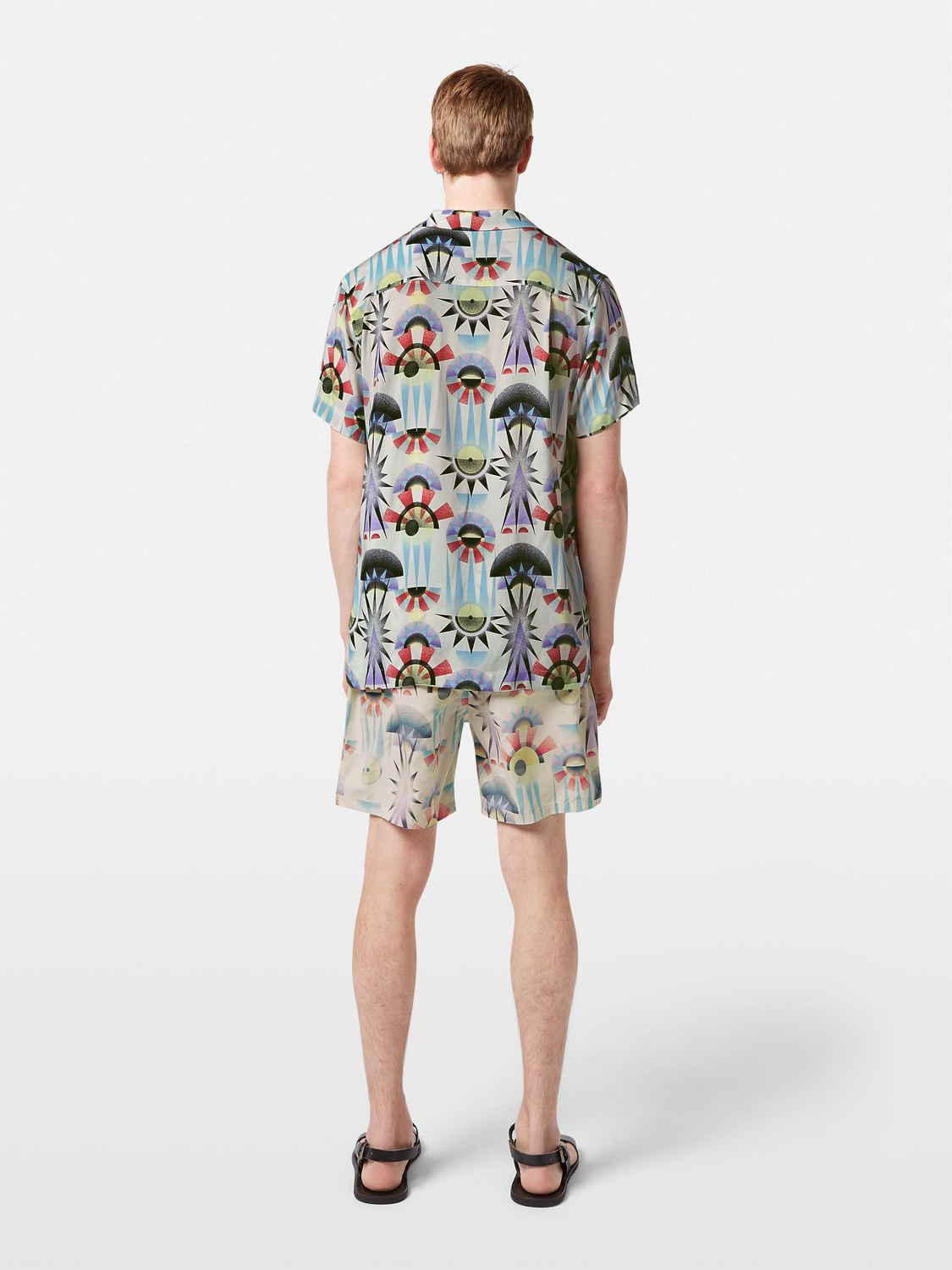Printed short-sleeved shirt by Scotch & Soda featuring colorful patterns, casual fit, and button-down front.
