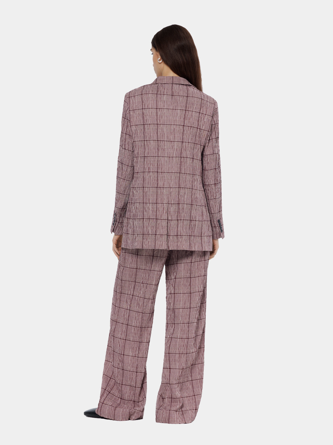 Wide-fit rose-colored pants by Scotch & Soda, shown from the back with a relaxed, stylish fit and tailored waistband.