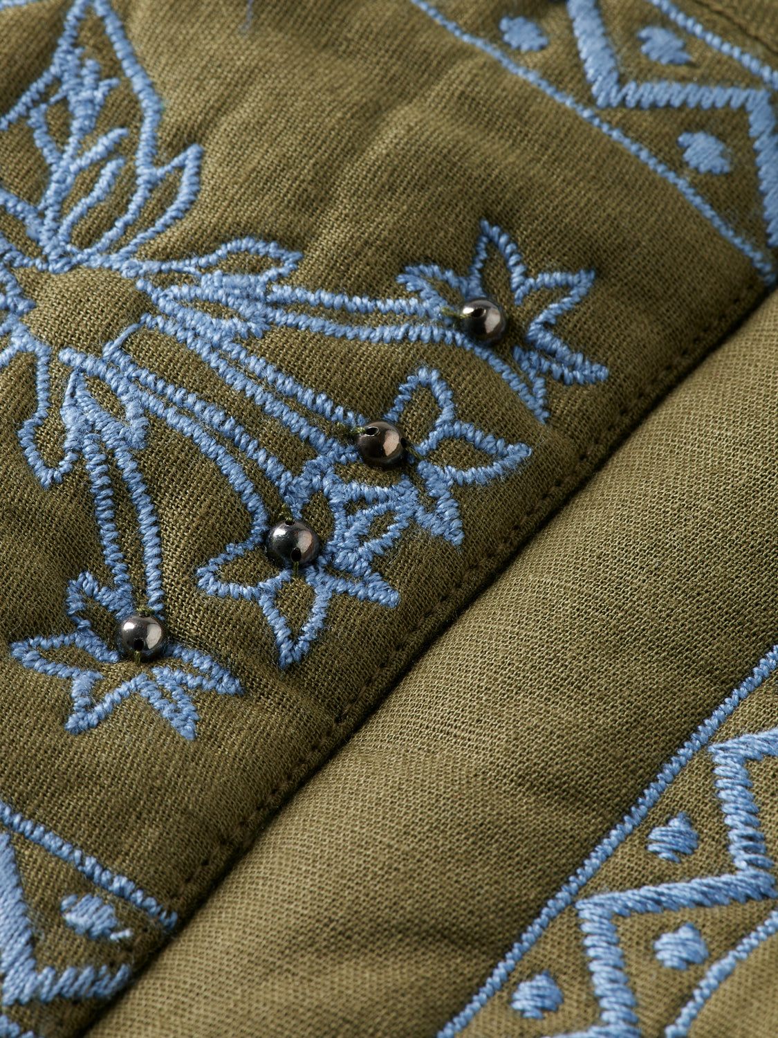 Floral embroidered Scotch & Soda inbetweens gilet with colorful embroidery and lightweight fabric, suitable for layering.
