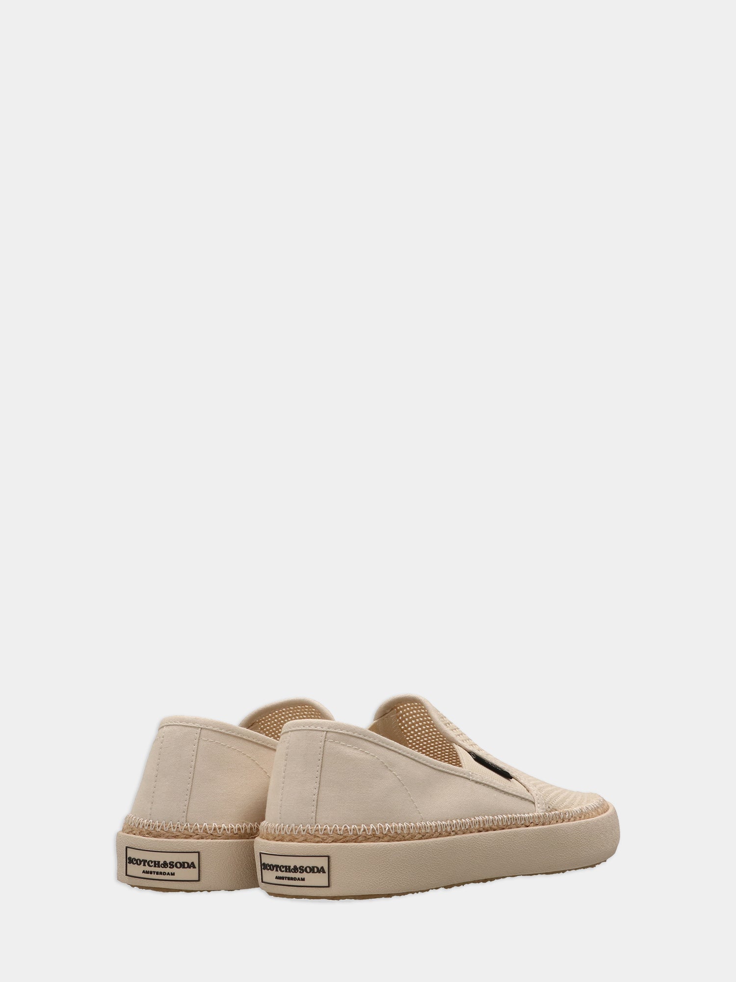 Scotch & Soda Izomi slip-on shoes in neutral tones, featuring a sleek design and comfortable footwear style.