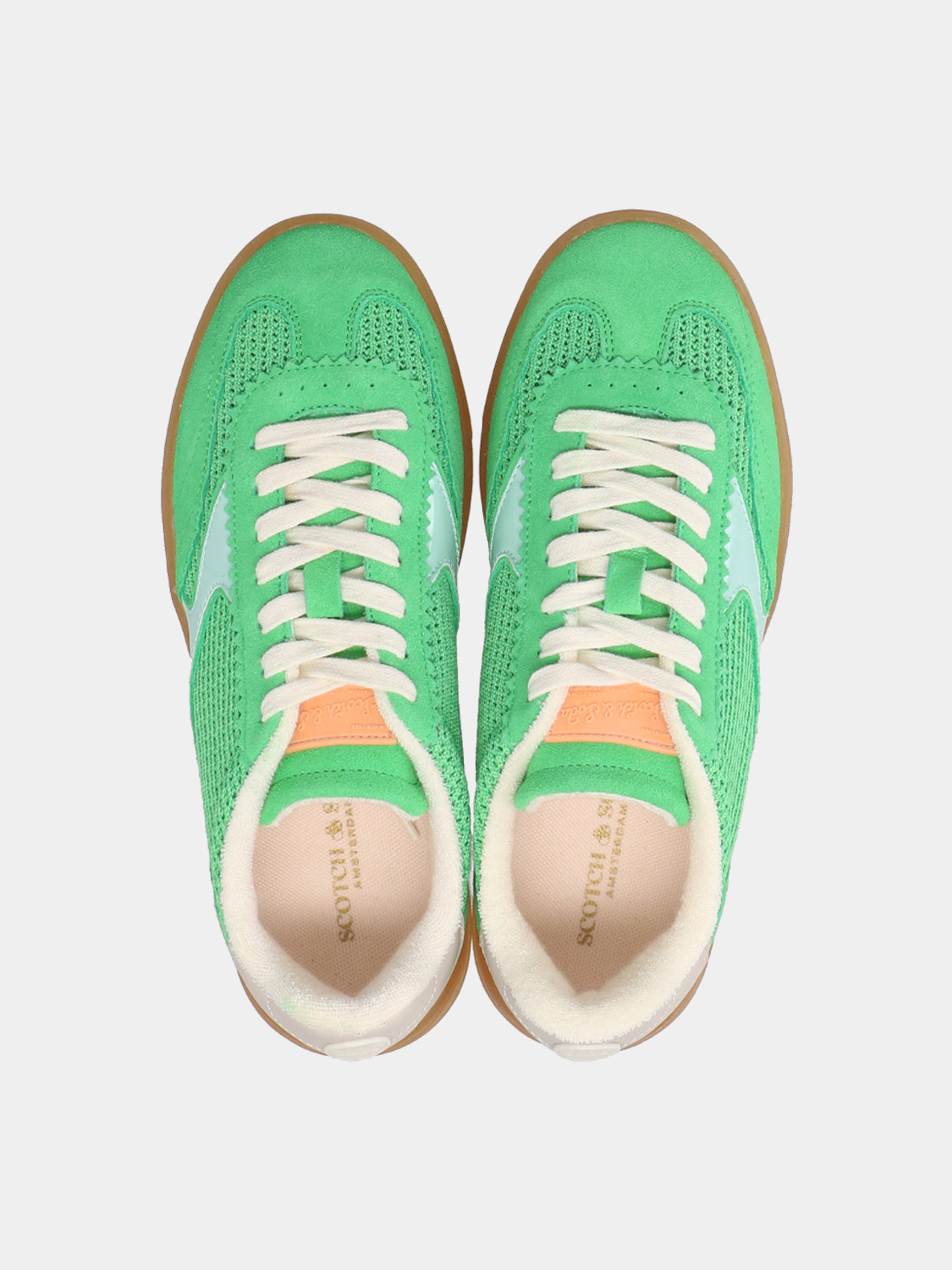 White Nixie sneakers by SCOTCH & SODA featuring a sleek design, laced-up style, and rubber sole on a clean background.