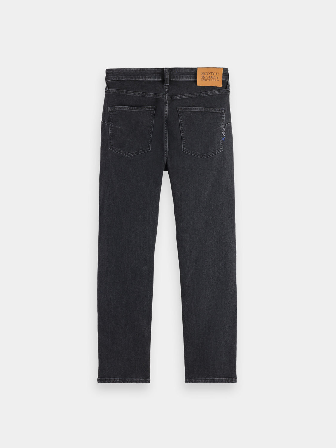 Back view of Scotch & Soda Zee straight-fit denim jeans showing classic blue denim fabric and clean stitching.