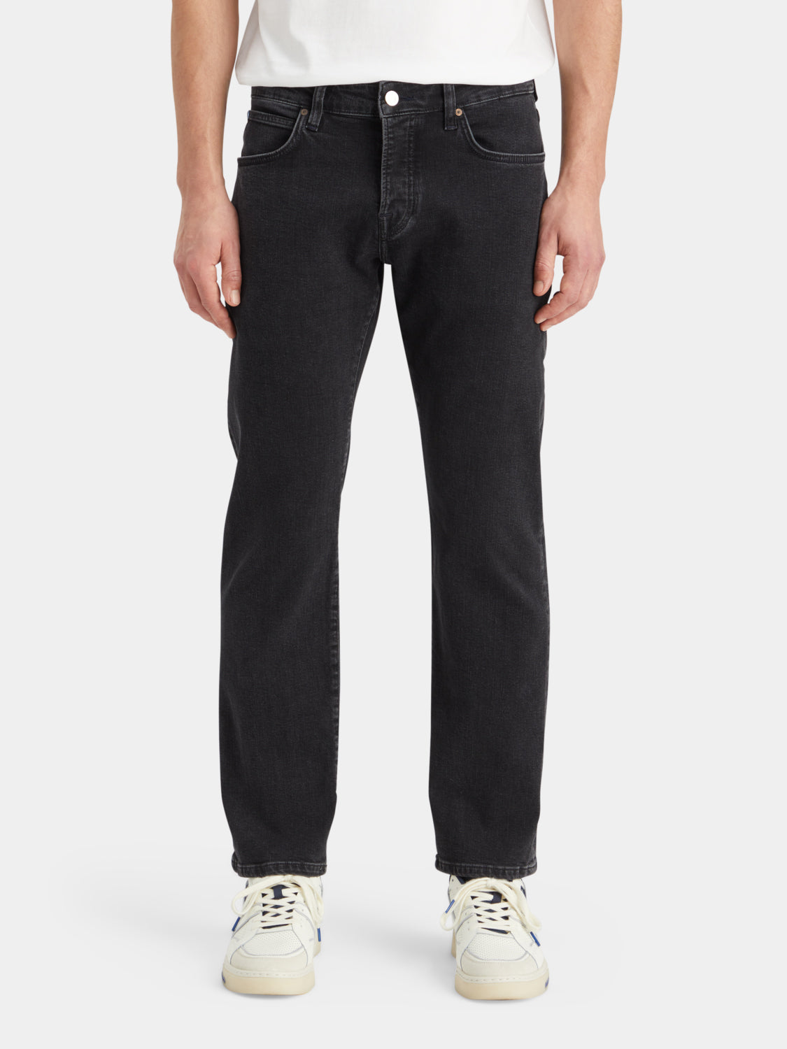 Scotch & Soda Zee straight-fit denim jeans shown on a model, featuring classic five-pocket design and medium wash denim.